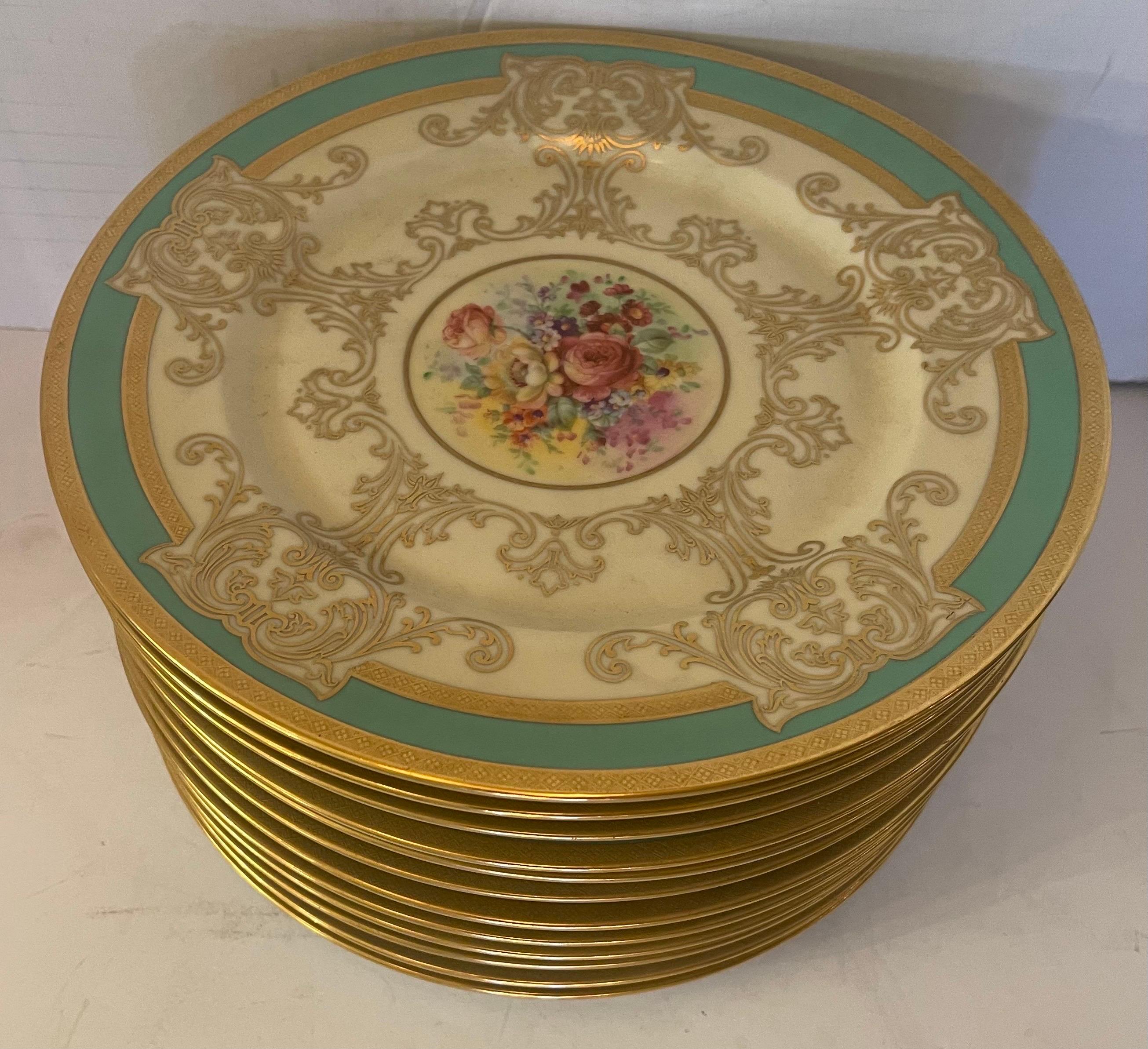 A wonderful floral pattern service of 12 dinner porcelain plates by Heinrich And Company, Bavaria.