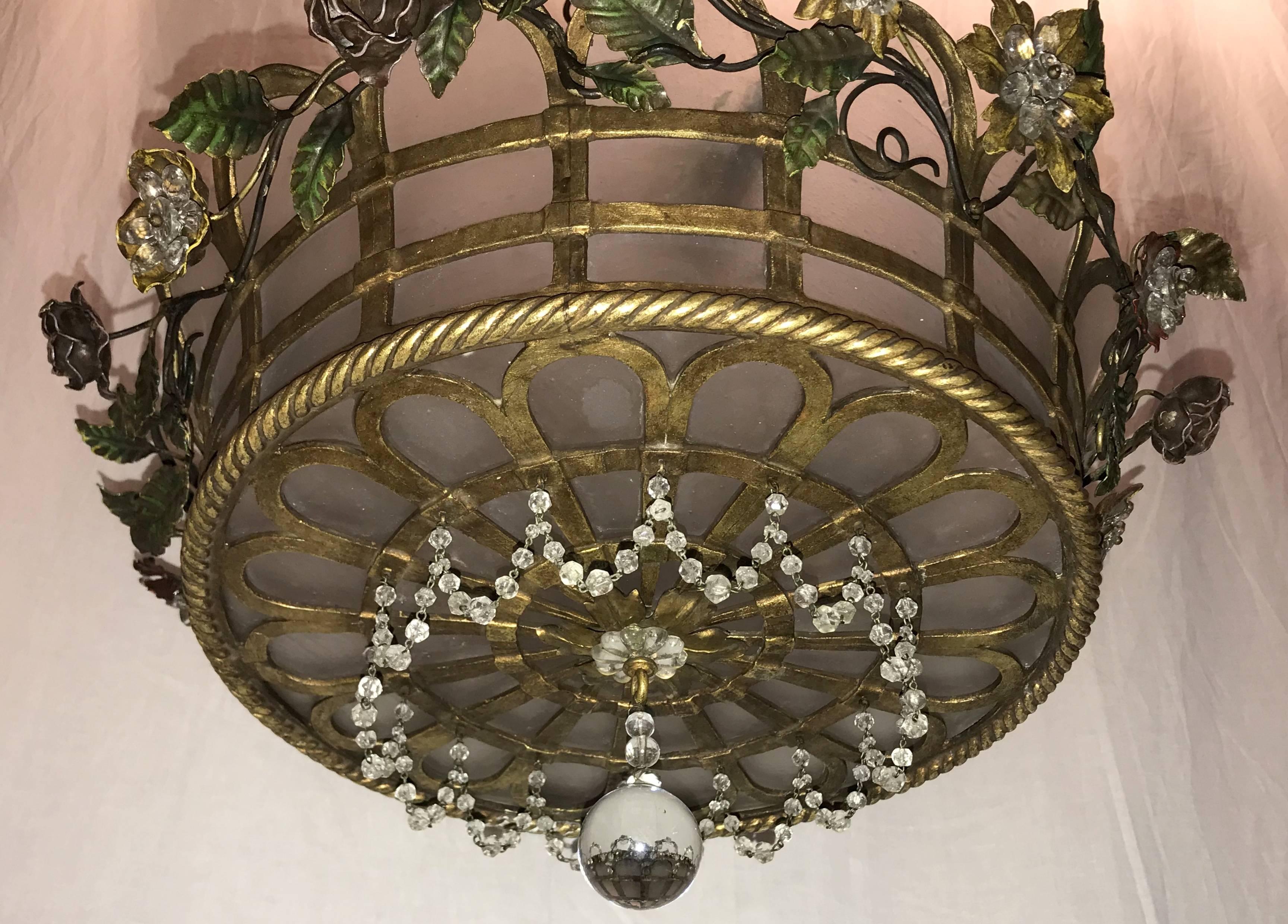 A wonderful French bronze and frosted glass insert with beaded flower and swags, woven basket form chandelier with three internal Edison light fixture.
Height is adjustable.