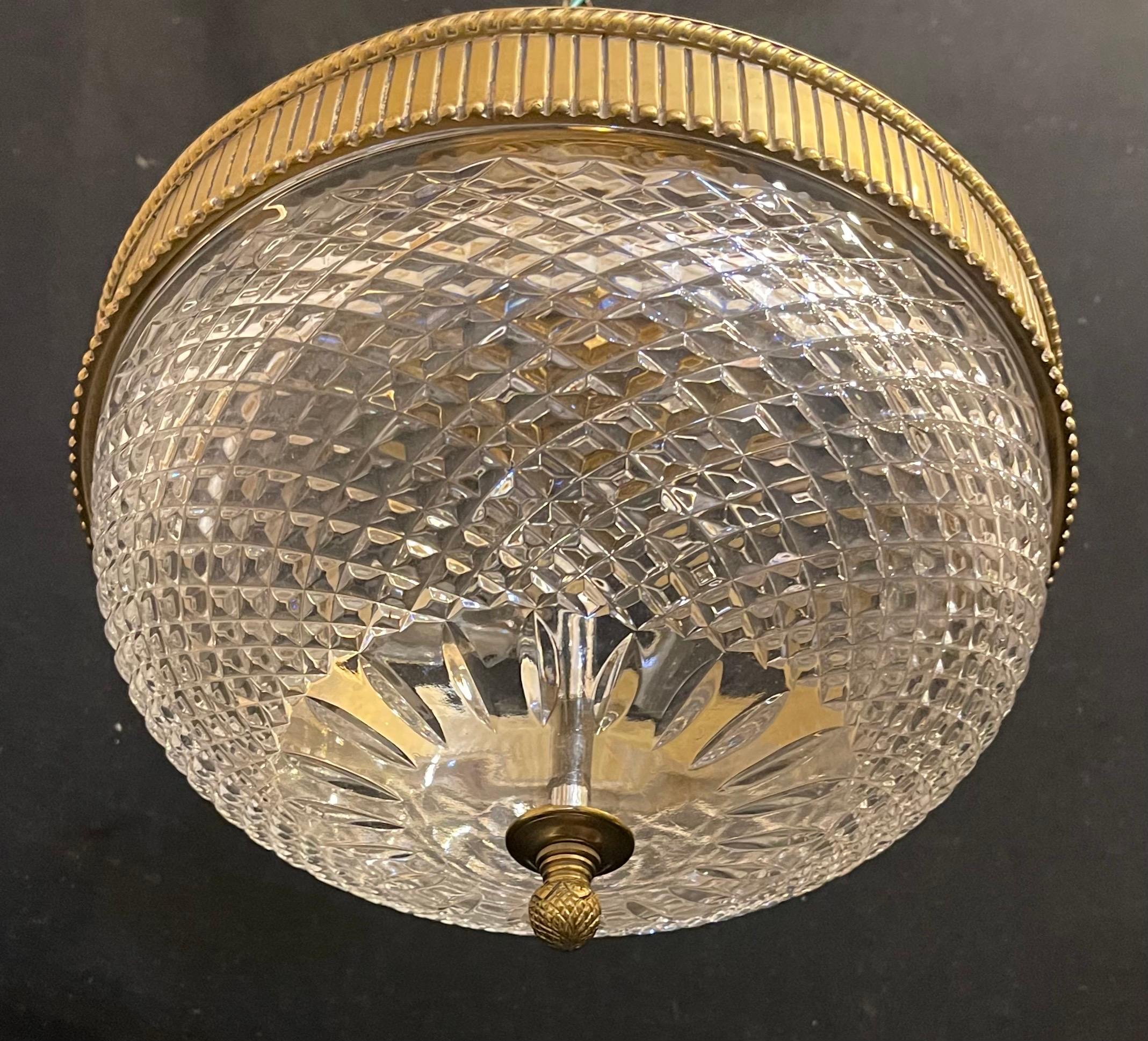 A Wonderful French Bronze Mounted With Diamond Faceted Cut Crystal Center Crystal Semi Flush Mount 4 Candelabra Light Fixture, In The Manner Of Baccarat The Height Is Adjustable 
Purchased From Nestles, Acquired From Park Ave. NYC 

