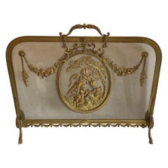 Merveilleux écran de cheminée chérubin français du 19ème siècle en bronze doré Louis XV en forme de guirlande