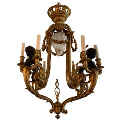 Wonderful French Cherub Neoclassical Doré Bronze Nine-Light Chandelier Fixture