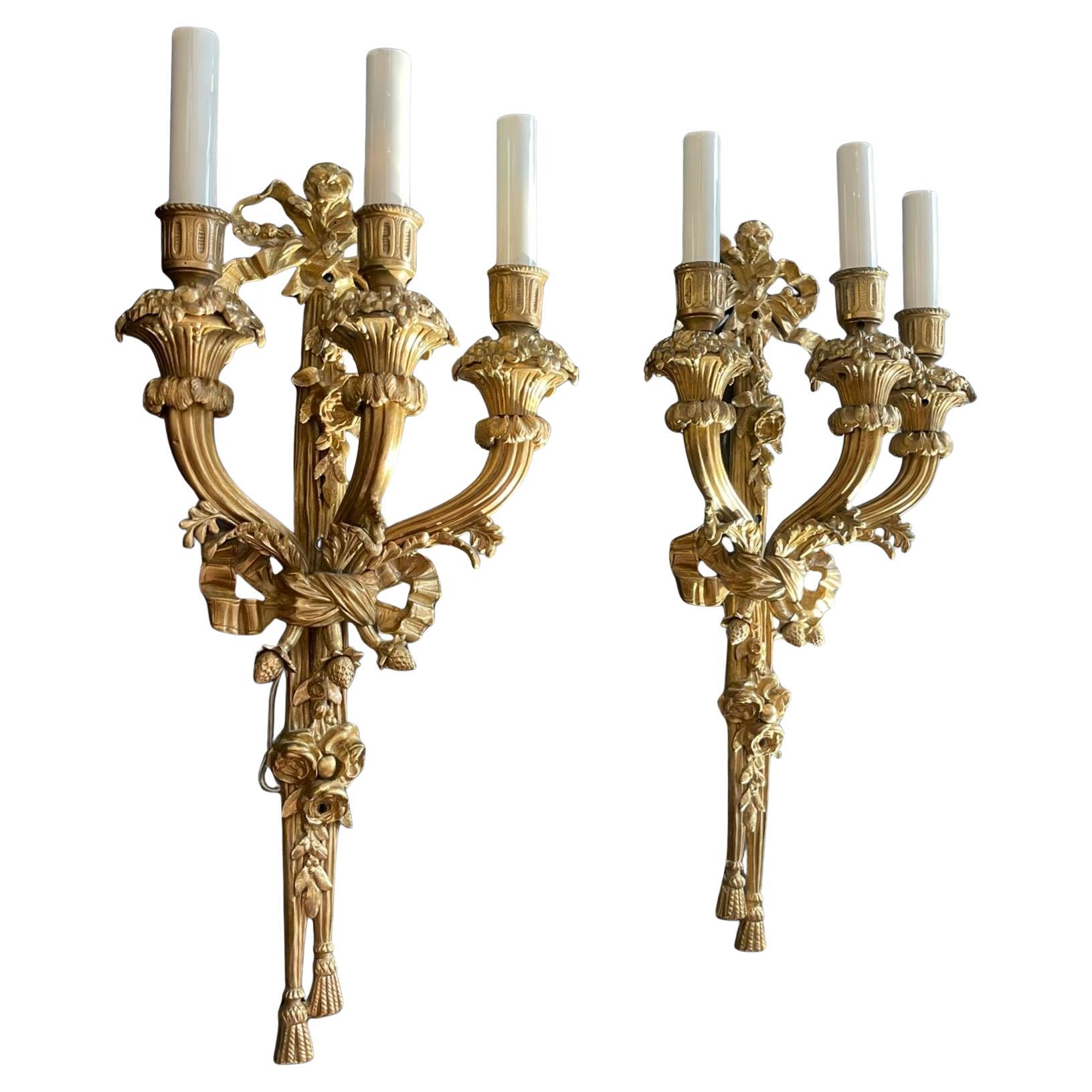 Wonderful French Dore Bronze Louis XVI Set Four Bronze Bow Top Filigree Sconces For Sale