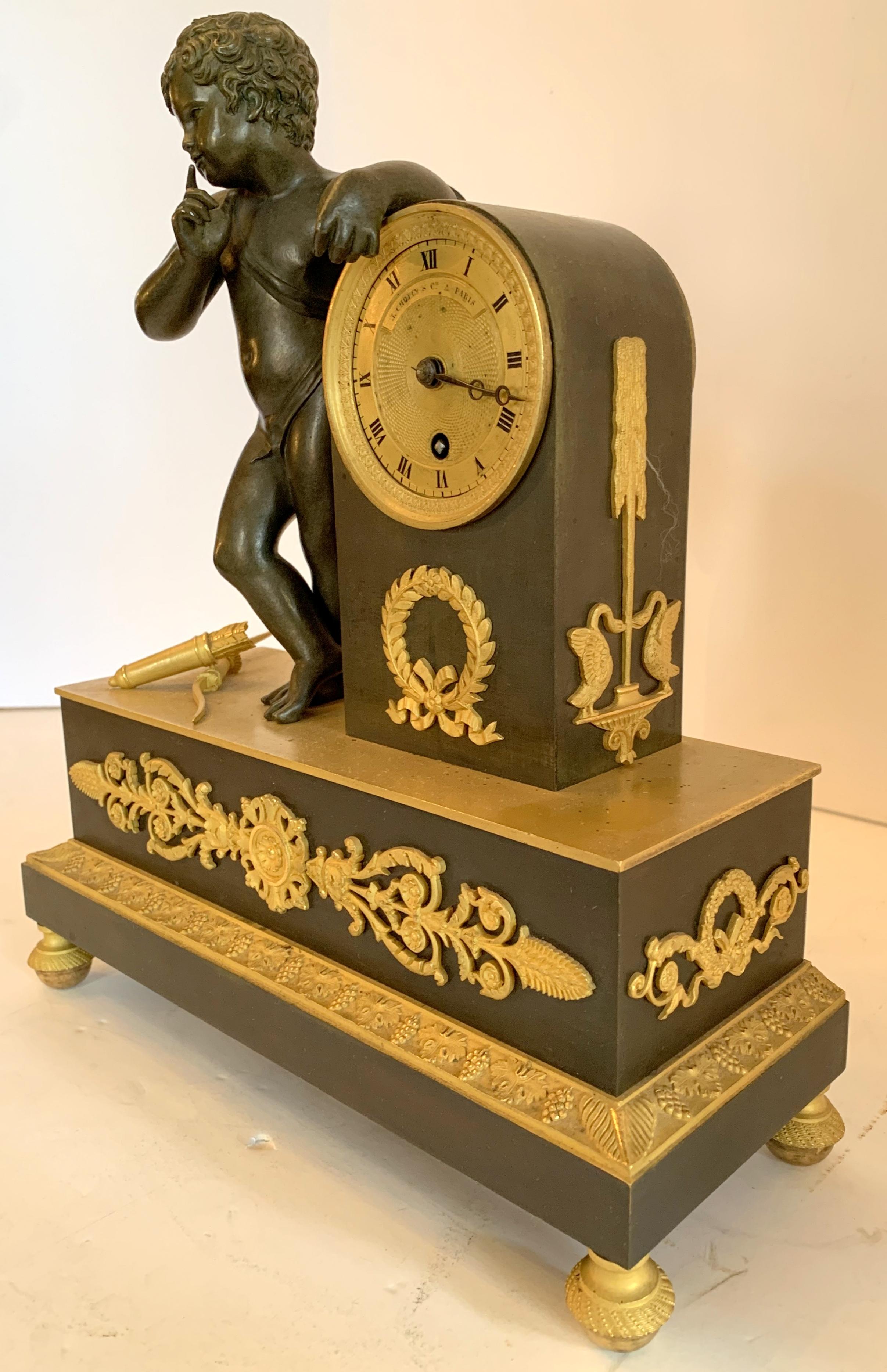 Wonderful French Empire Dore and Patinated Bronze Cherub Putti Wreath Clock In Good Condition For Sale In Roslyn, NY