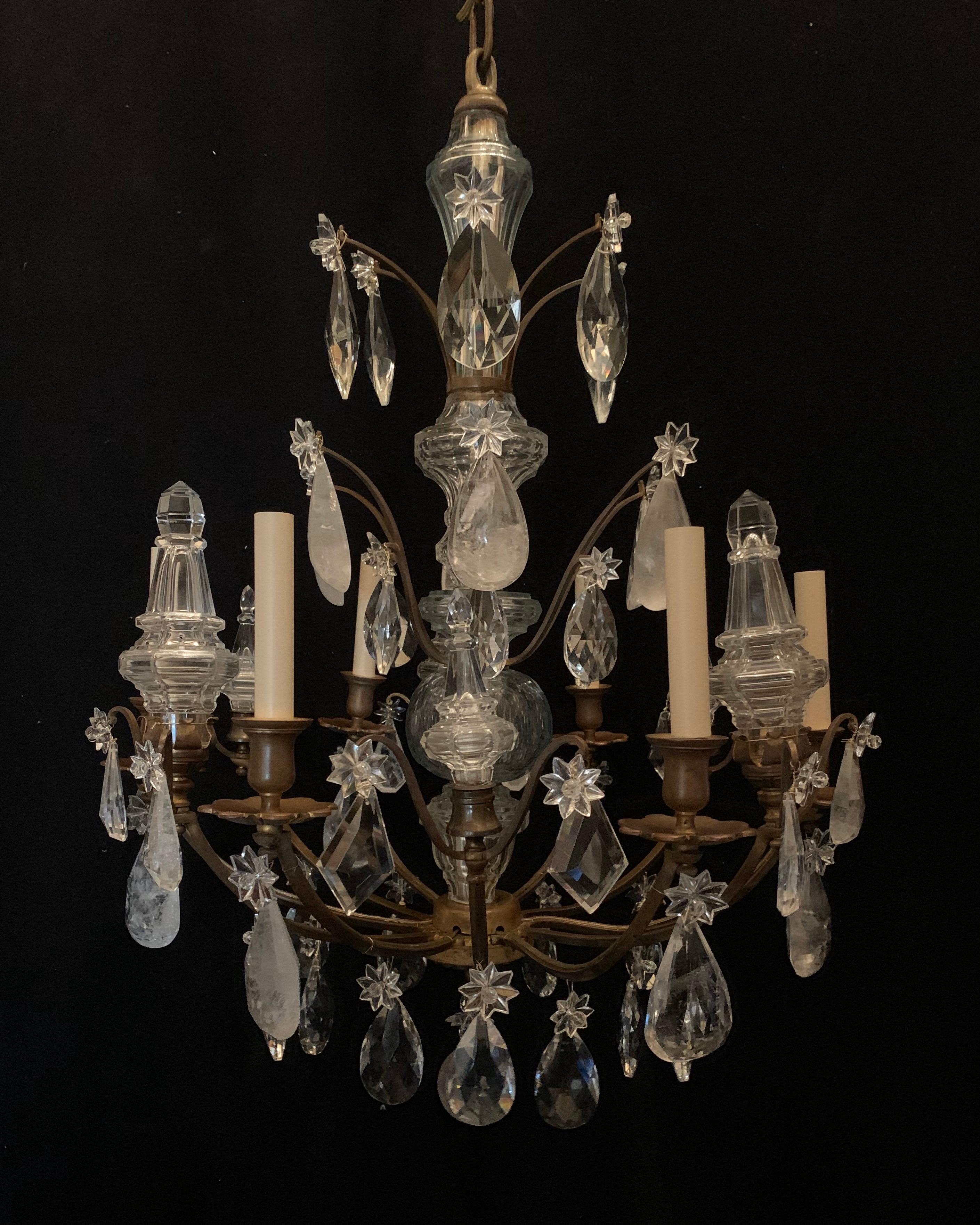 A wonderful French gilt bronze rock crystal star & finial / spear 6 candelabra chandelier in the manner of Baguès.
