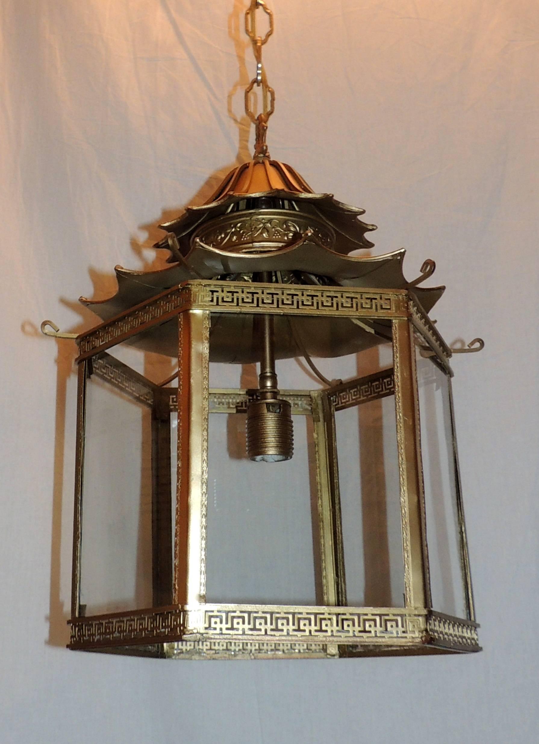 Wonderful French Gilt Bronze Pagoda 6 Panel Chinoiserie Octagonal Glass Lantern Fixture, Rewired With A New Socket Taking Up to 100 Watts. This Fixture Comes With As Much Chain As You Need As Well As Canopy And Mounting Hardware. 