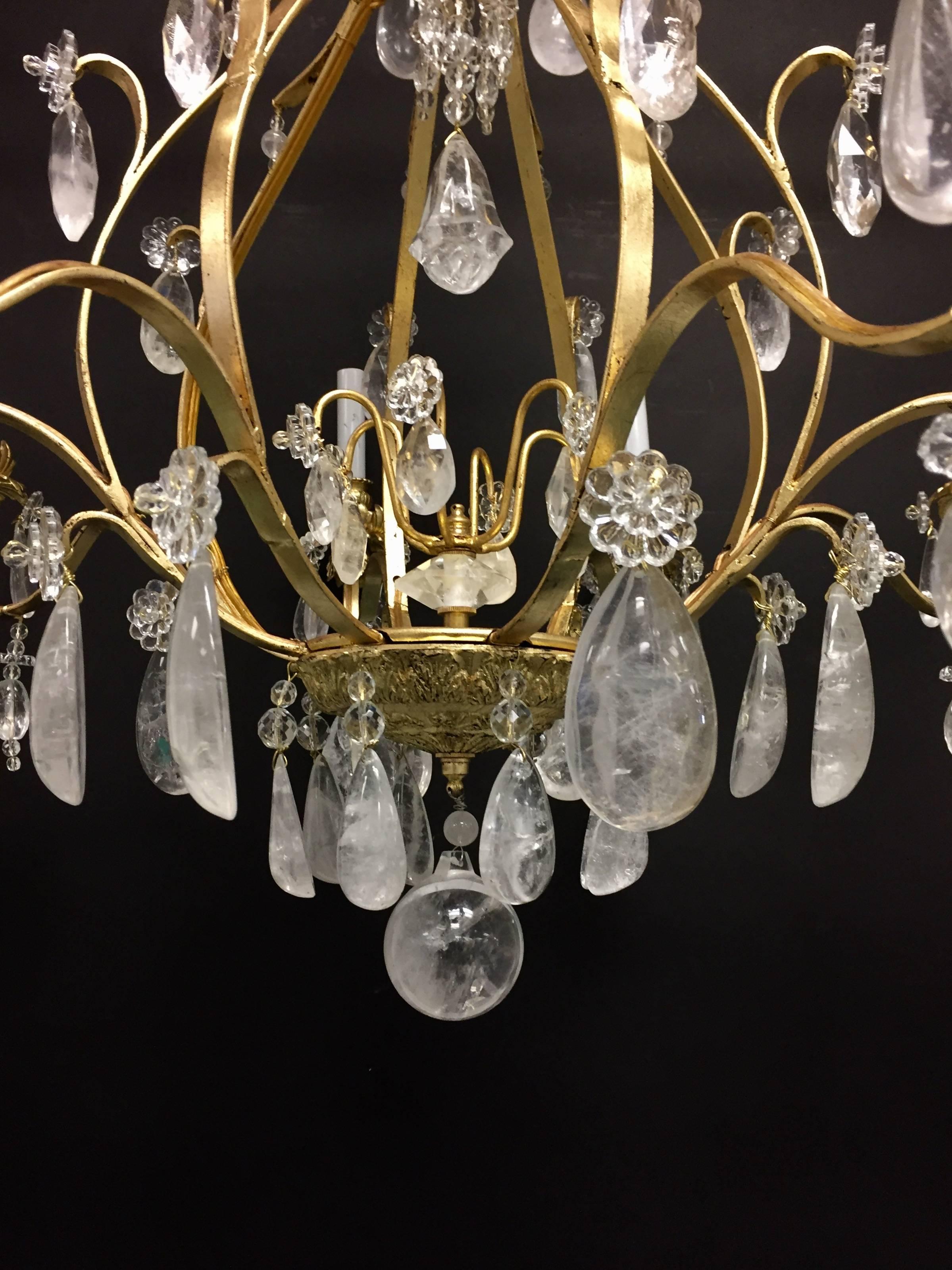 A wonderful French gold gilt iron Baguès style rock crystal eight-light chandelier
Completely redone and ready to enjoy.
Measures: 31