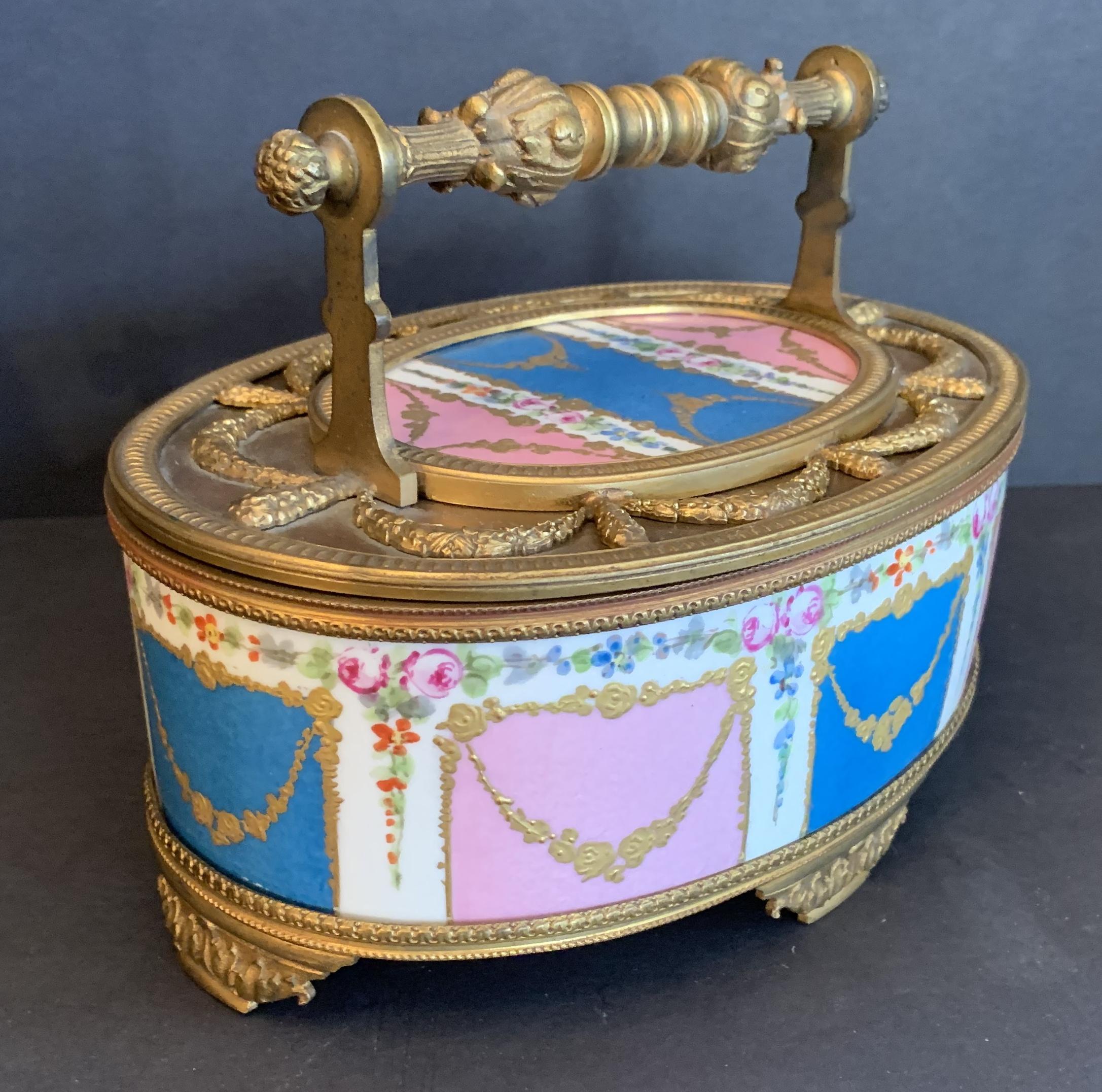 Wonderful French Hand Painted Sèvres Porcelain Bronze Ormolu Oval Casket Box In Good Condition In Roslyn, NY