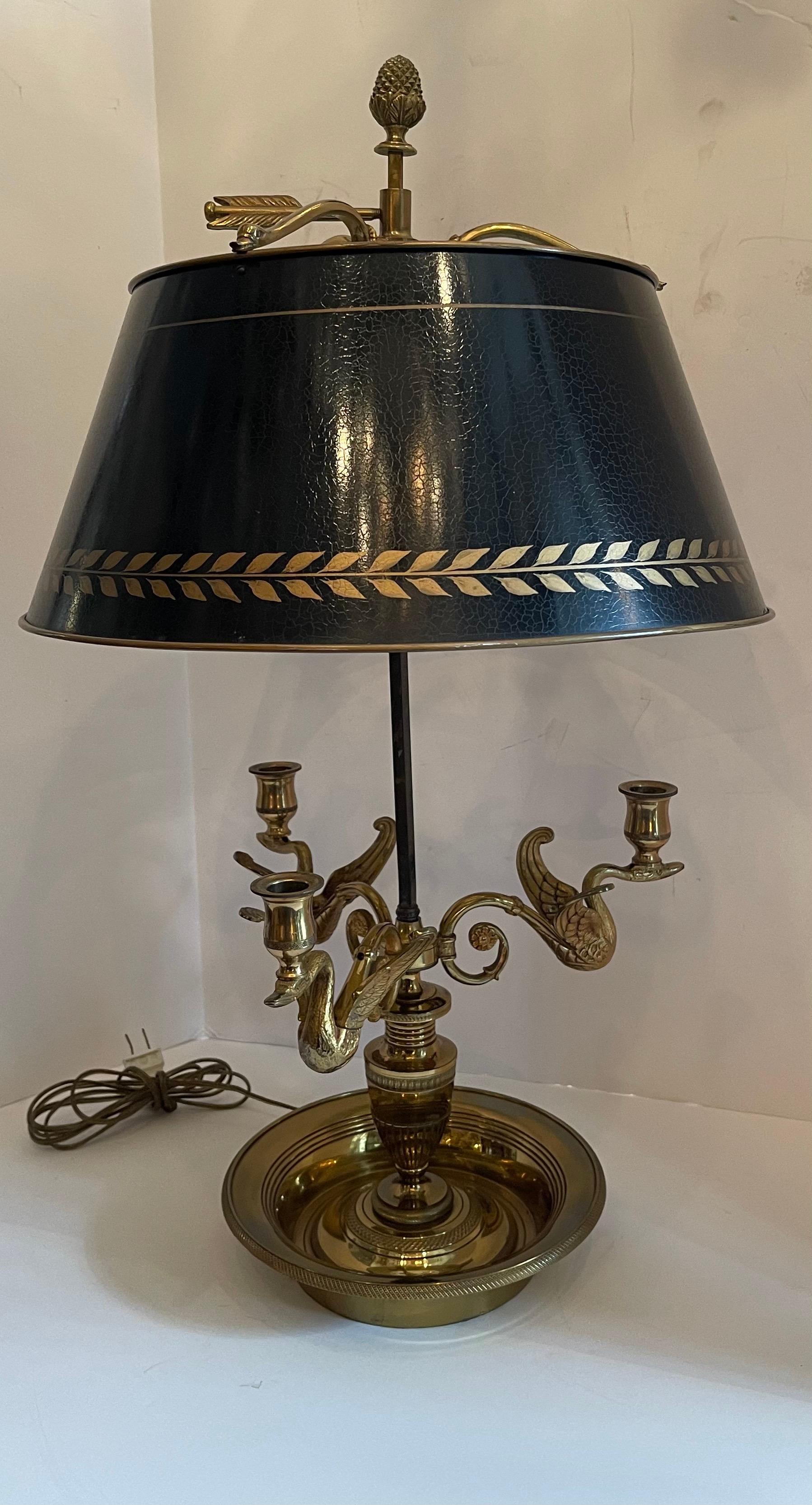 A wonderful french Louis XVI style gilt bronze three-arm swan arm bouillotte lamp with green tole shade.