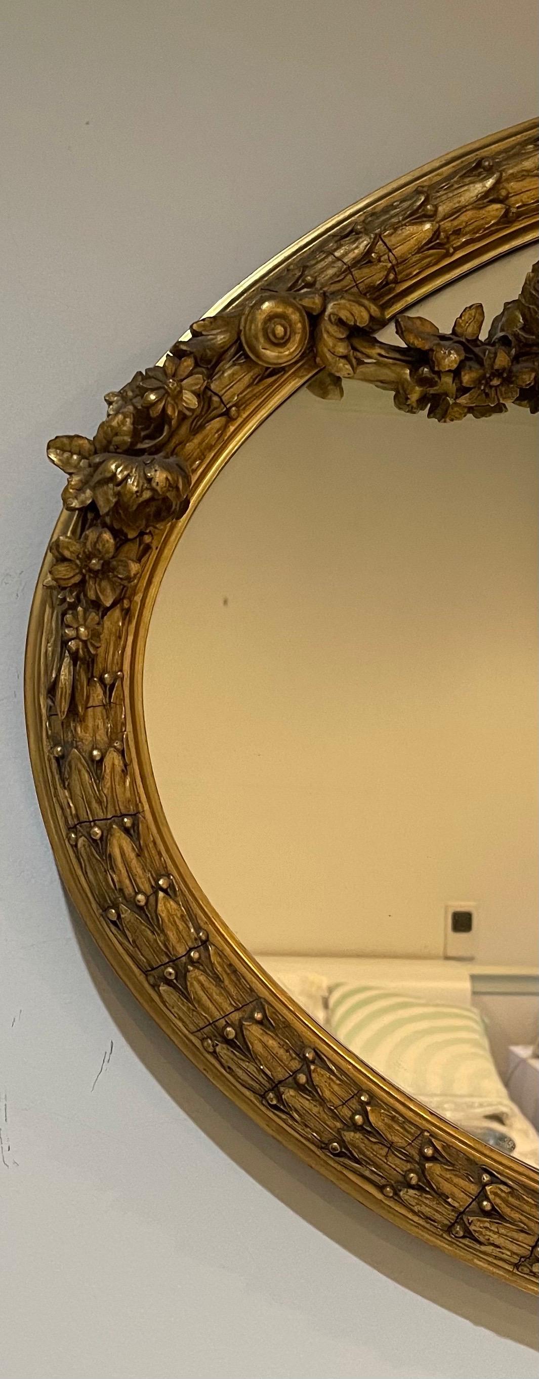 20th Century Wonderful French Louis XVI Horizontal Oval Giltwood Swag Over Mantle Mirror