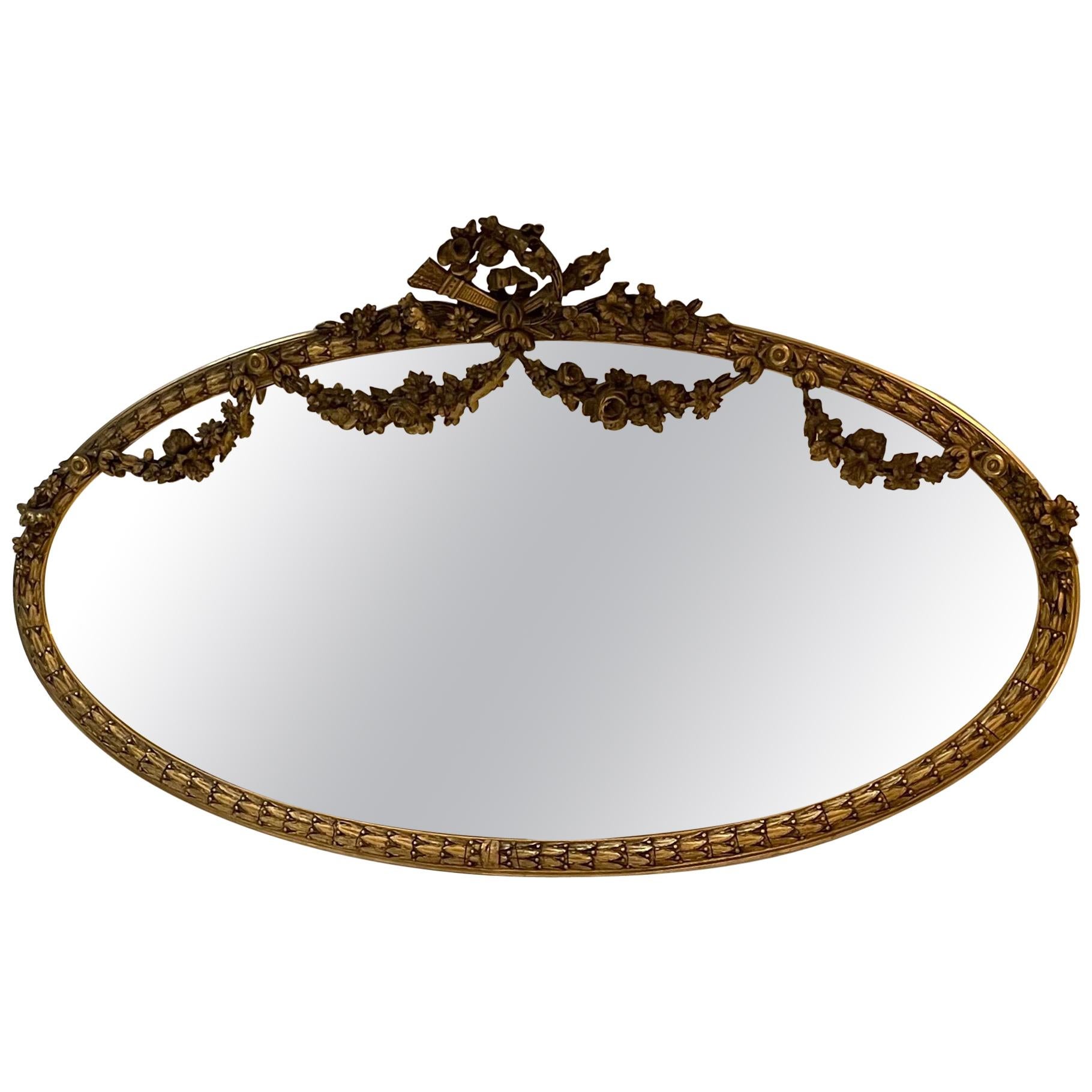 Wonderful French Louis XVI Horizontal Oval Giltwood Swag Over Mantle Mirror