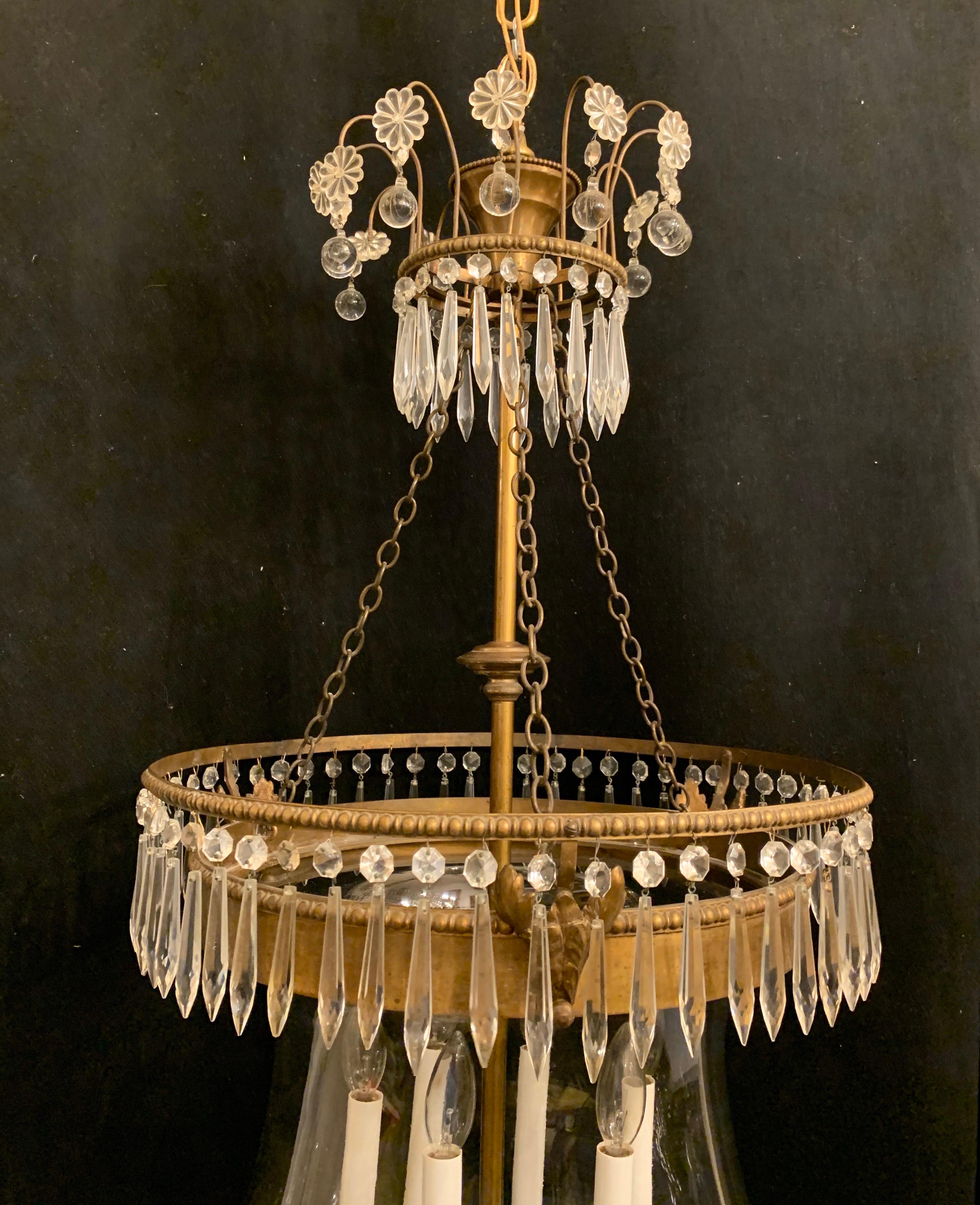 A wonderful French neoclassical large Empire bronze and crystal adorning glass bell jar lantern fixture with 6 candelabra lights.