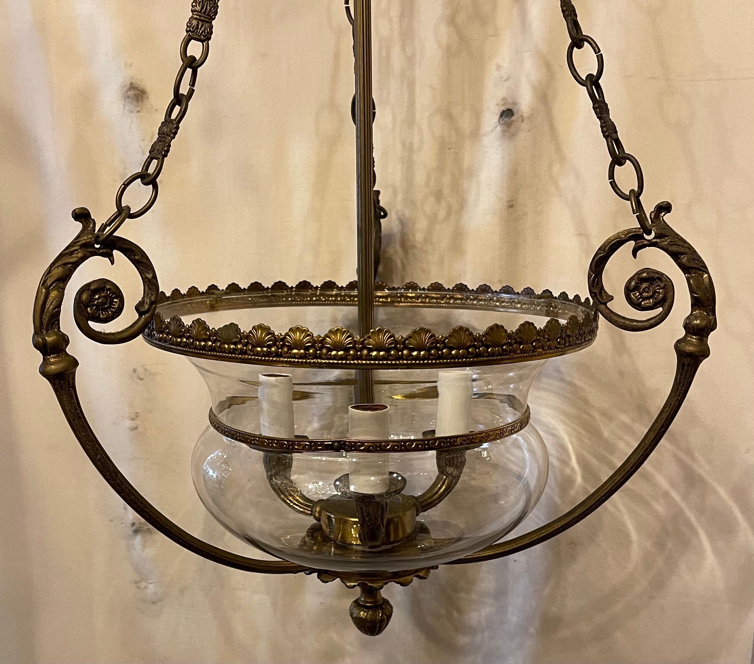 A wonderful French style semi flush mount bronze & glass bell jar form lantern chandelier fixture with 3 candelabra sockets each taking 40 watts, rewired and ready to install with adjustable canopy and mounting hardware.