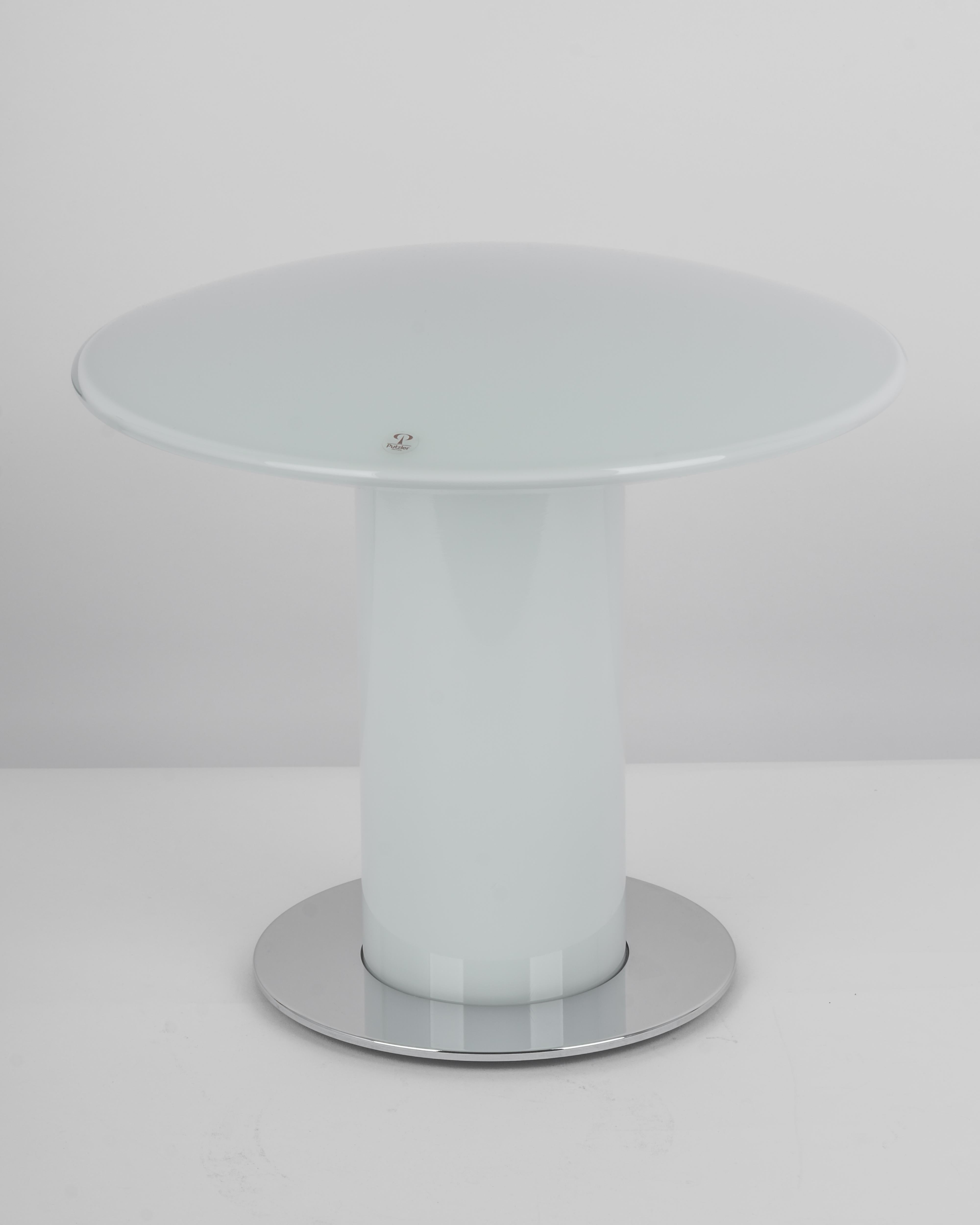 Wonderful mushroom table lamp by Peill & Putzler, Germany, 1970s. Made of a single piece.
Great glass body and its edgy quality contrast nicely with the smooth surface and shape of the mushroom. 

Measures: Large table lamp
Height 30 cm // 11.8
