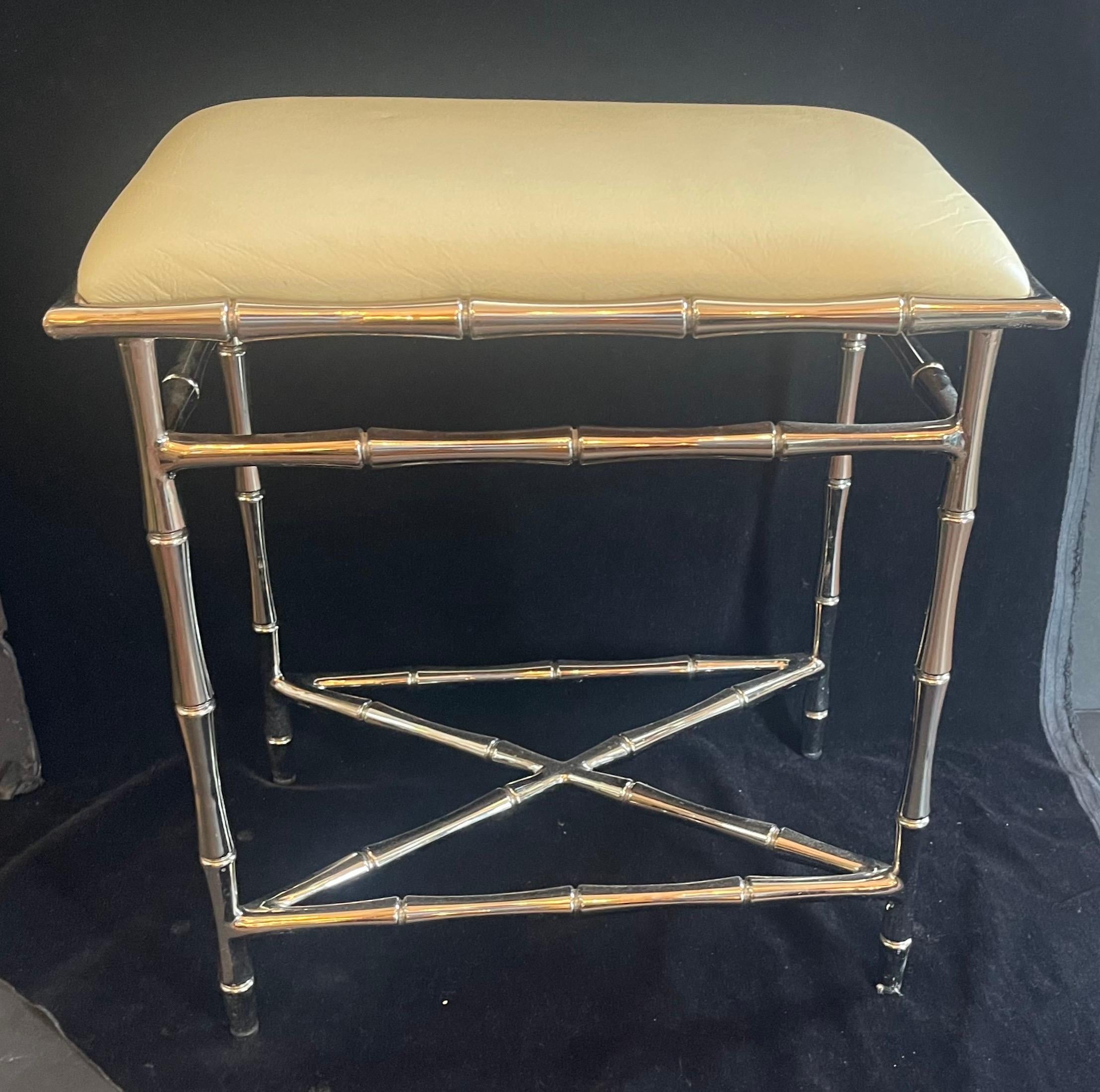 A Wonderful Hollywood Regency Style Modern Faux Bamboo Polished Nickel Bench With Off White Faux Leather Seat In The Manner And Style Of Jansen / Bagues