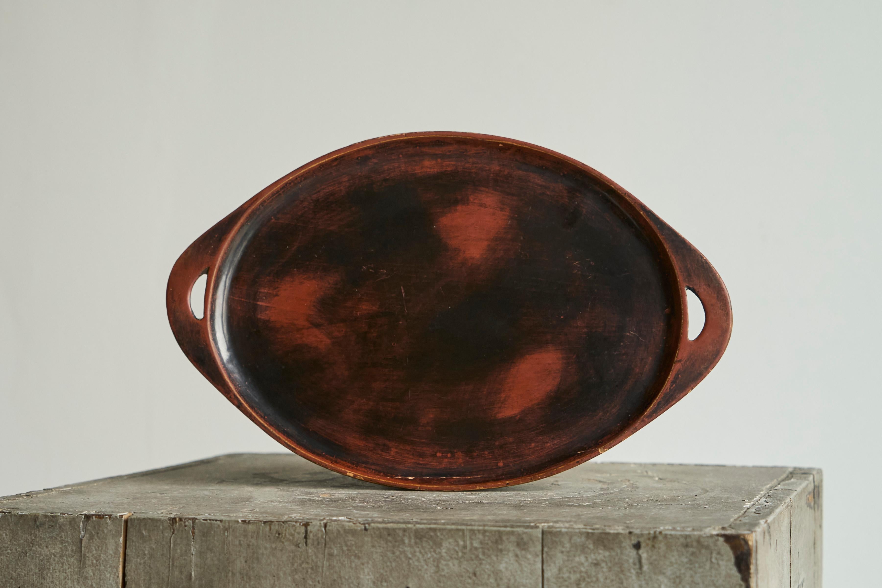 Wonderful Japanese Tray in Wood Early 20th Century.

This is a wonderful early 20th century medium sized Japanese wooden tray. Great shape and colors - shifting from red to black. Nice patina and wear due to age and use. From a high end estate -