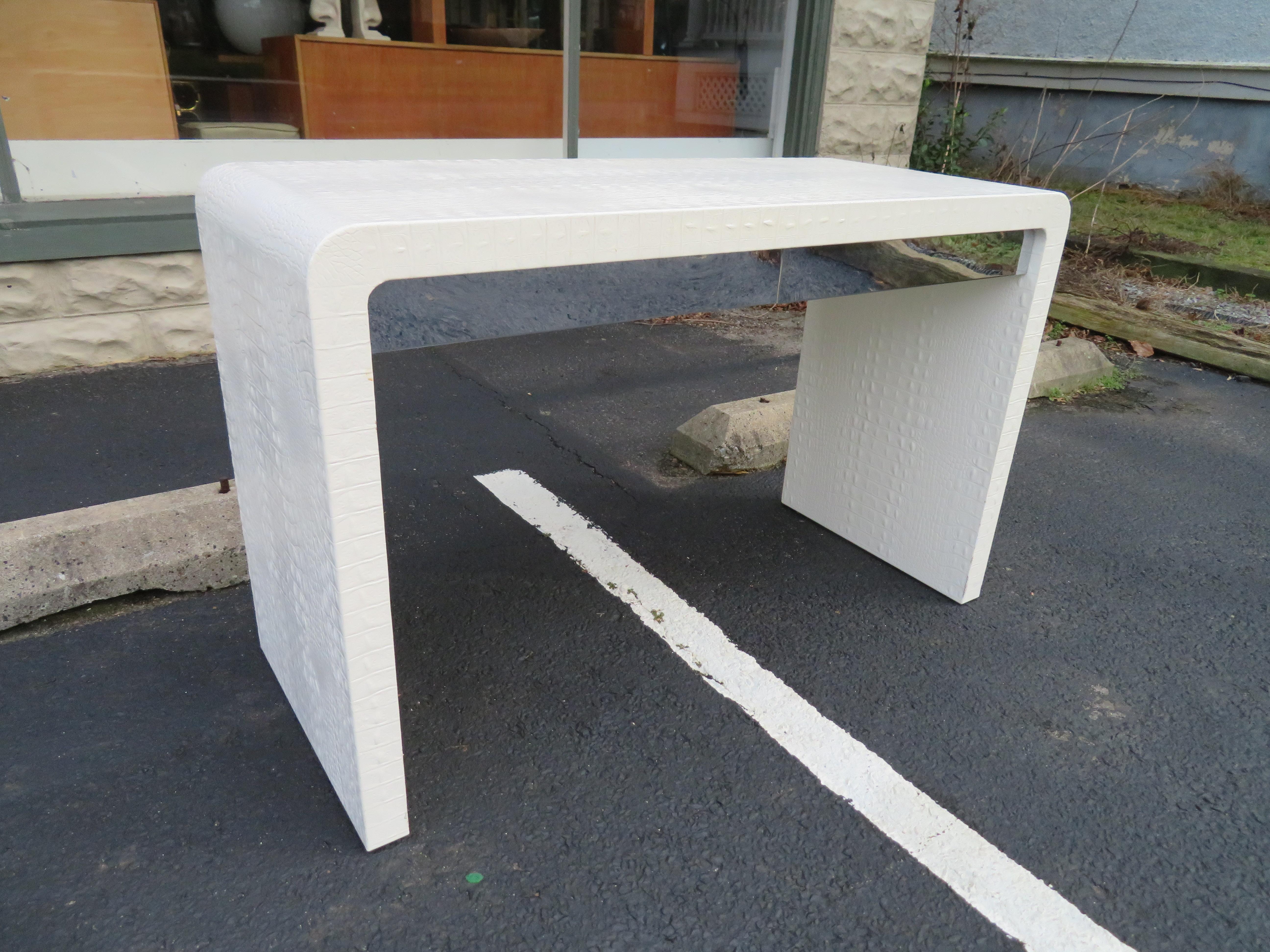 Wonderful Karl Springer style faux alligator covered desk with 2 chrome clad drawers. This desk is just the right size to put anywhere-can even be used as a console table. Desk measures 30.5