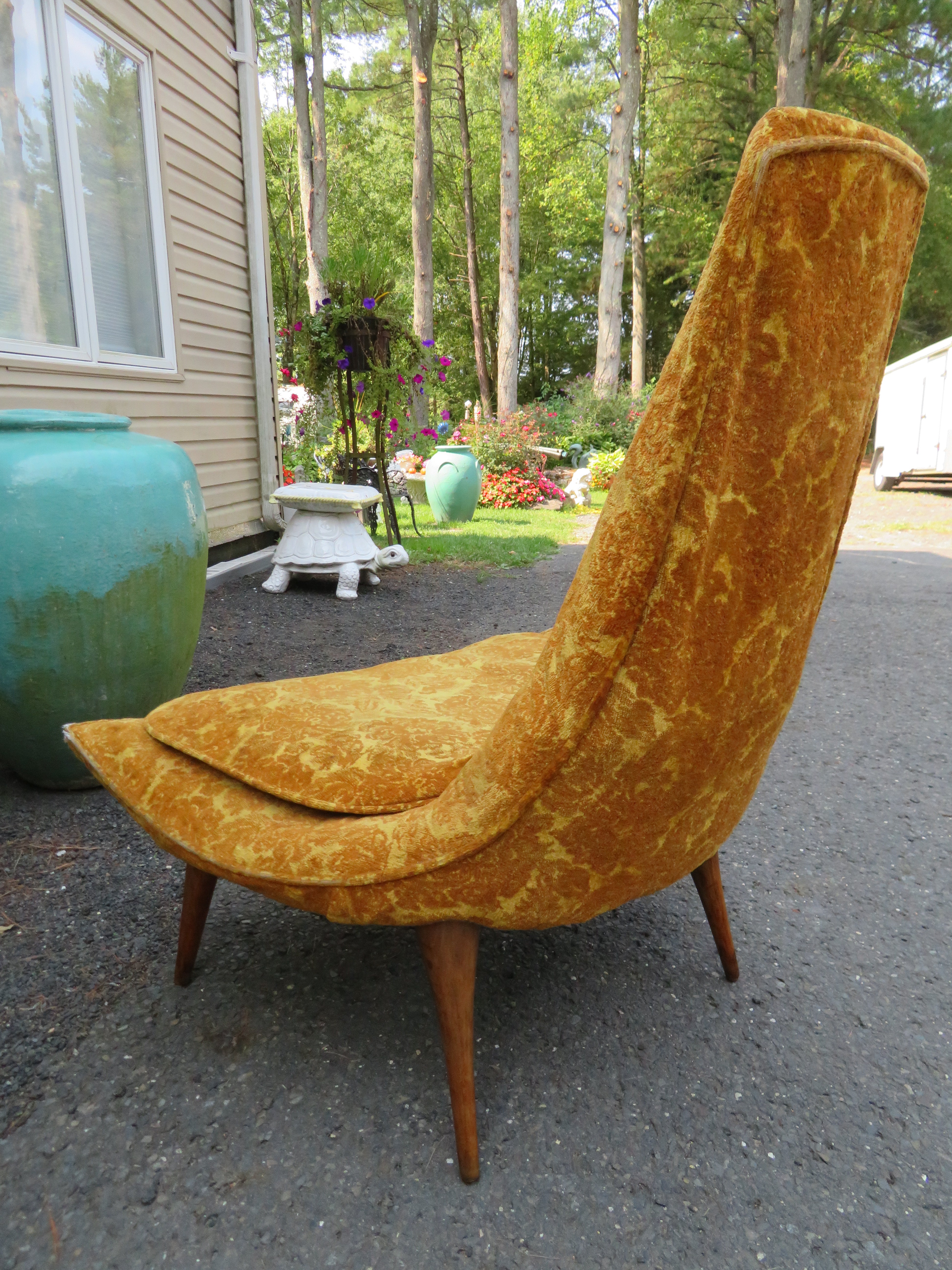 Wonderful Karpen of California high back walnut slipper lounge chair. This chair retains its original fabric and will need to be re-upholstered. The sculptural walnut legs look very nice retaining their original finish. This chair measures 38'T x