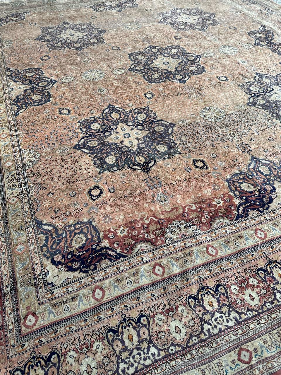 Introducing an exquisite Turkish rug from Sivas: This fine masterpiece boasts an enchanting all-over floral design on a star backdrop. Crafted with utmost care, it showcases natural hues and is meticulously hand-knotted using wool velvet on a cotton
