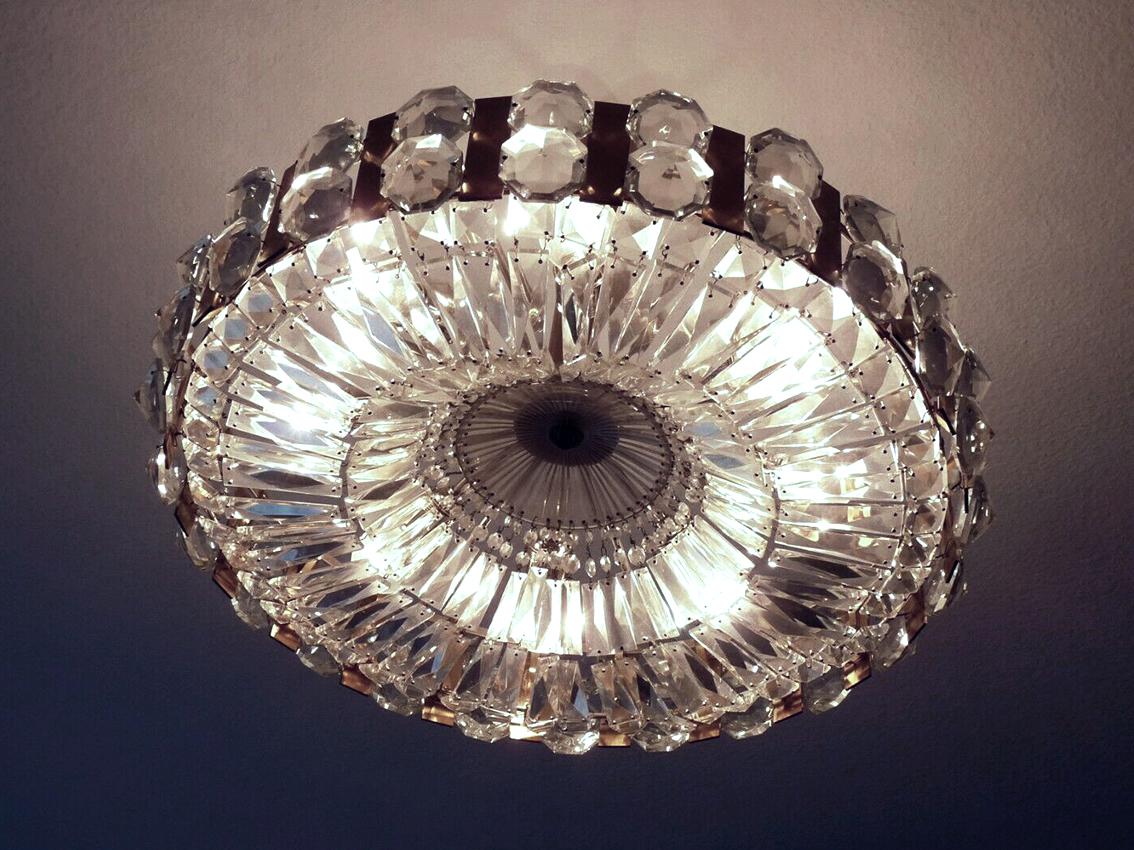 Wonderful crystal glass, brass and nickel pendant chandelier.
Austria, 1960s.
Measures:
Diameter 27.5 in
Height (body) 6 in
Lamp sockets: 8x E27 (US E26).