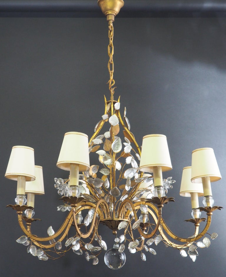 A wonderful, very rare eight-arm gilt iron and crystal flower chandelier by Maison Baguès, Paris, circa 1950s.

Socket: 8 x e14 for standard screw bulbs.

The condition is excellent.



  