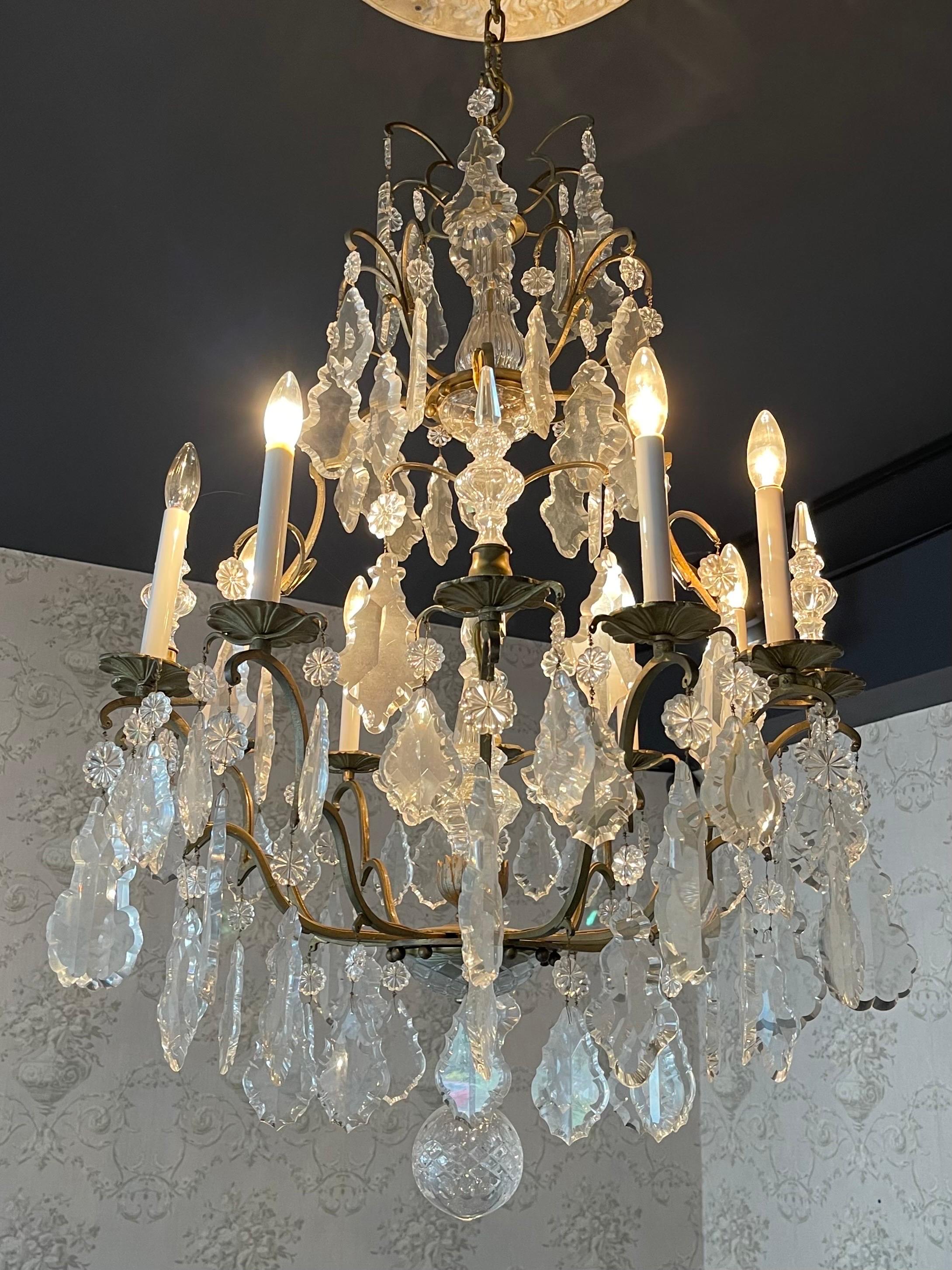 A wonderful large French bronze & crystal Louis XV bird cage with 3 spikes alternating the 6 candelabra lights and a large centerpiece spike in the middle of the chandelier.