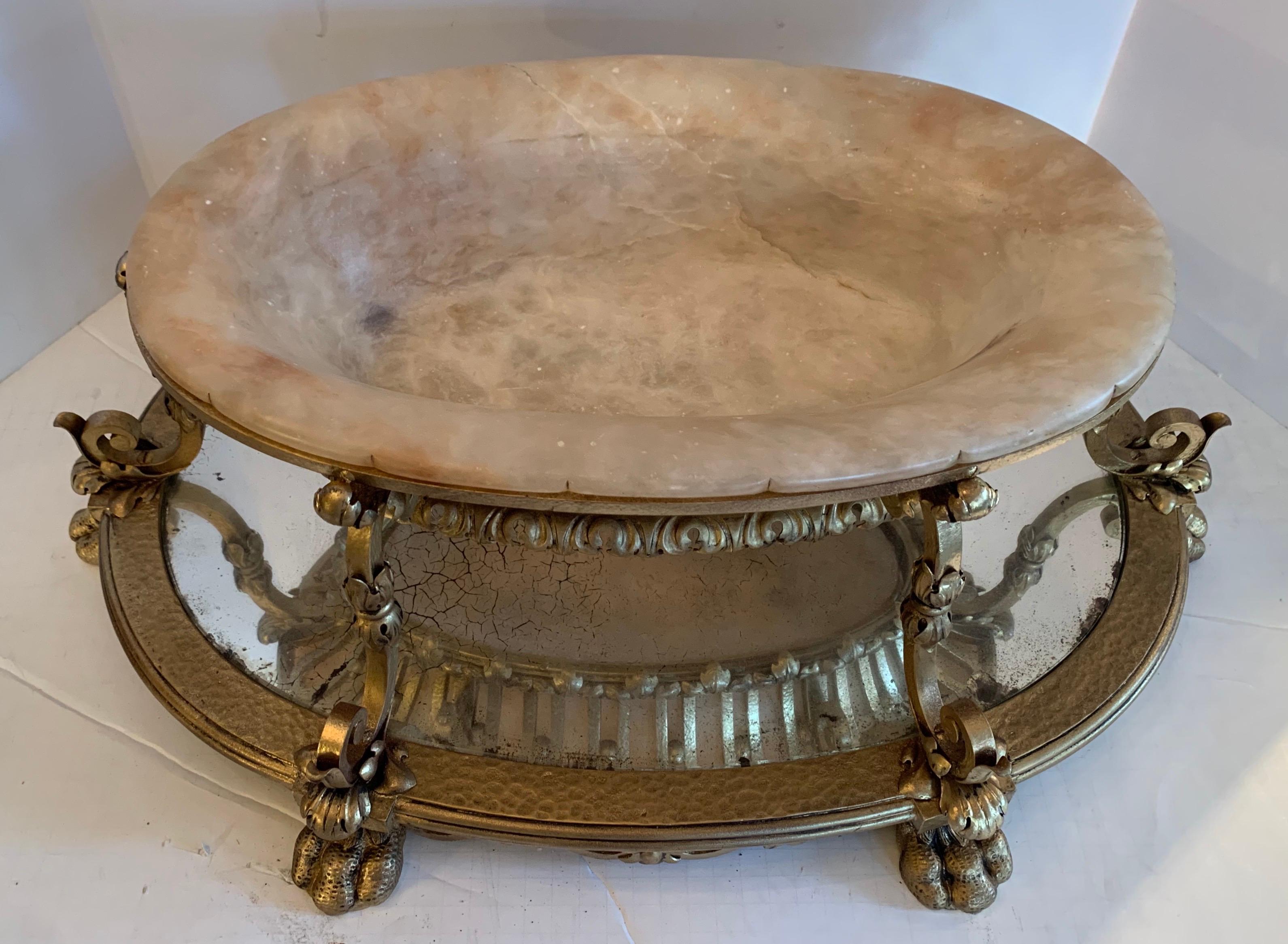 A wonderful large French gilt iron and carved marble inset very fine centerpiece / jardinière in the manner and quality of Caldwell.
   