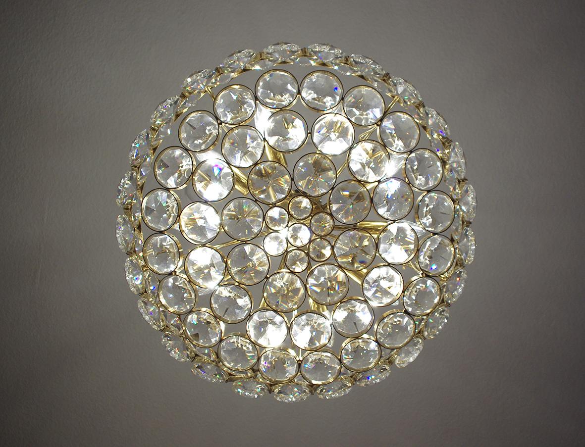 Wonderful crystal glass and gold-plated brass pendant chandelier by Palwa (Palme & Walter). 
Germany, 1960s. 
Measures: 
Diameter 24in
Height (body) 12in.

