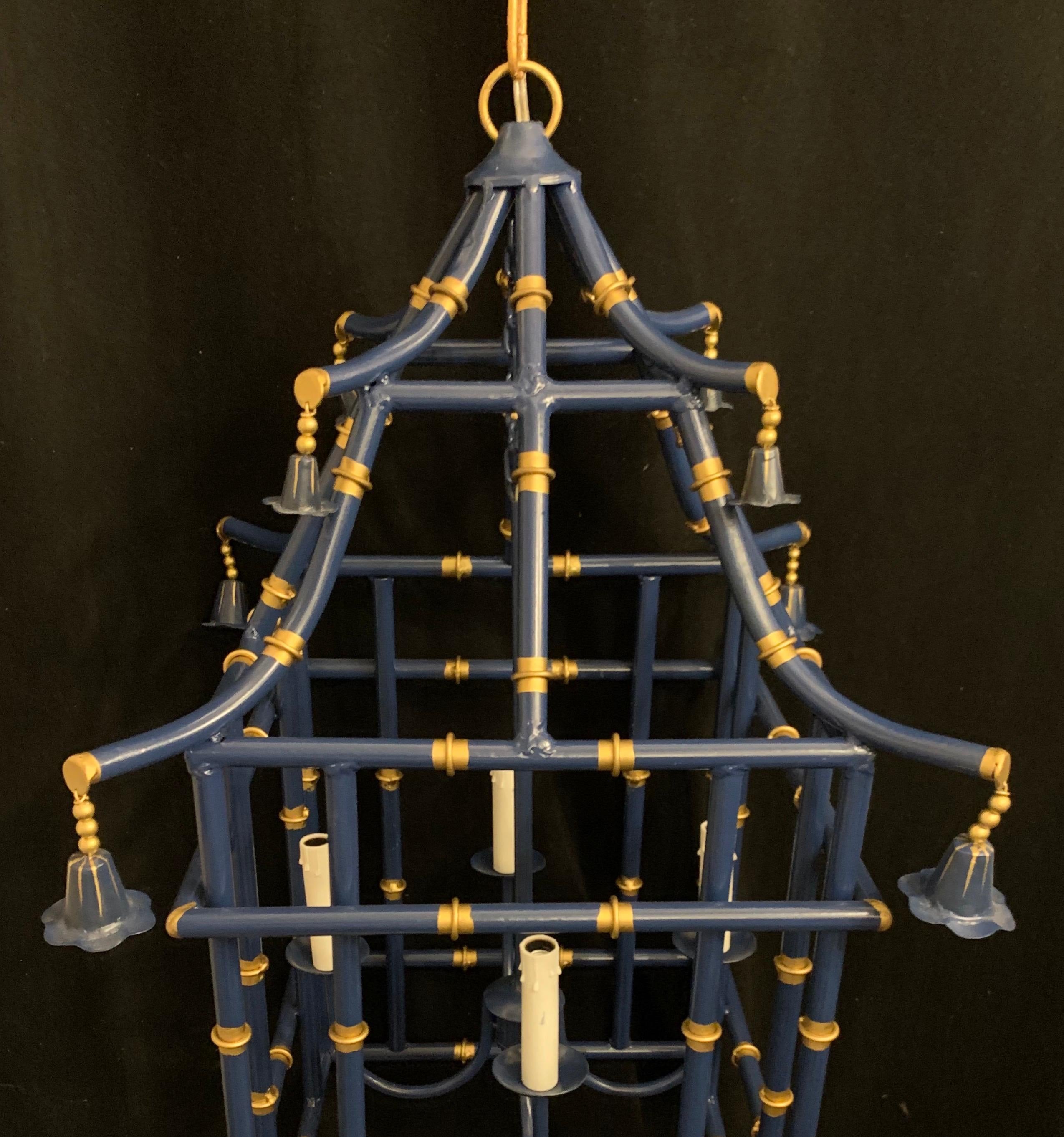 A wonderful large navy blue gold gilt pagoda bamboo chinoiserie lantern 4-light fixtures
*Two available 

Each sold separately.