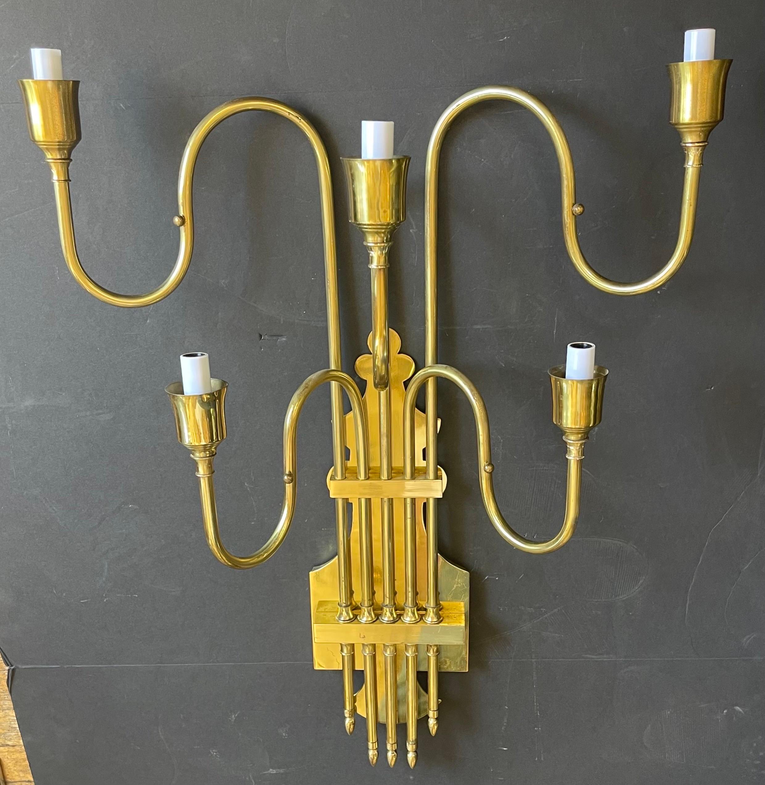 A wonderful large pair of 5 candelabra light Mid-Century Modern Tommi Parzinger style brass sconces
Dimensions: H 30