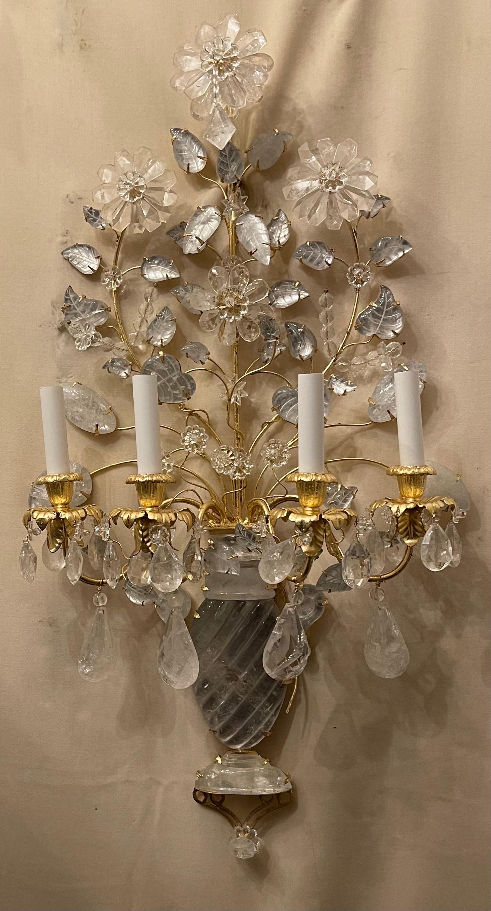 A wonderful pair of four candelabra light French gold gilt and rock crystal flower / urn form Maison Baguès style sconces, they are completely rewired.