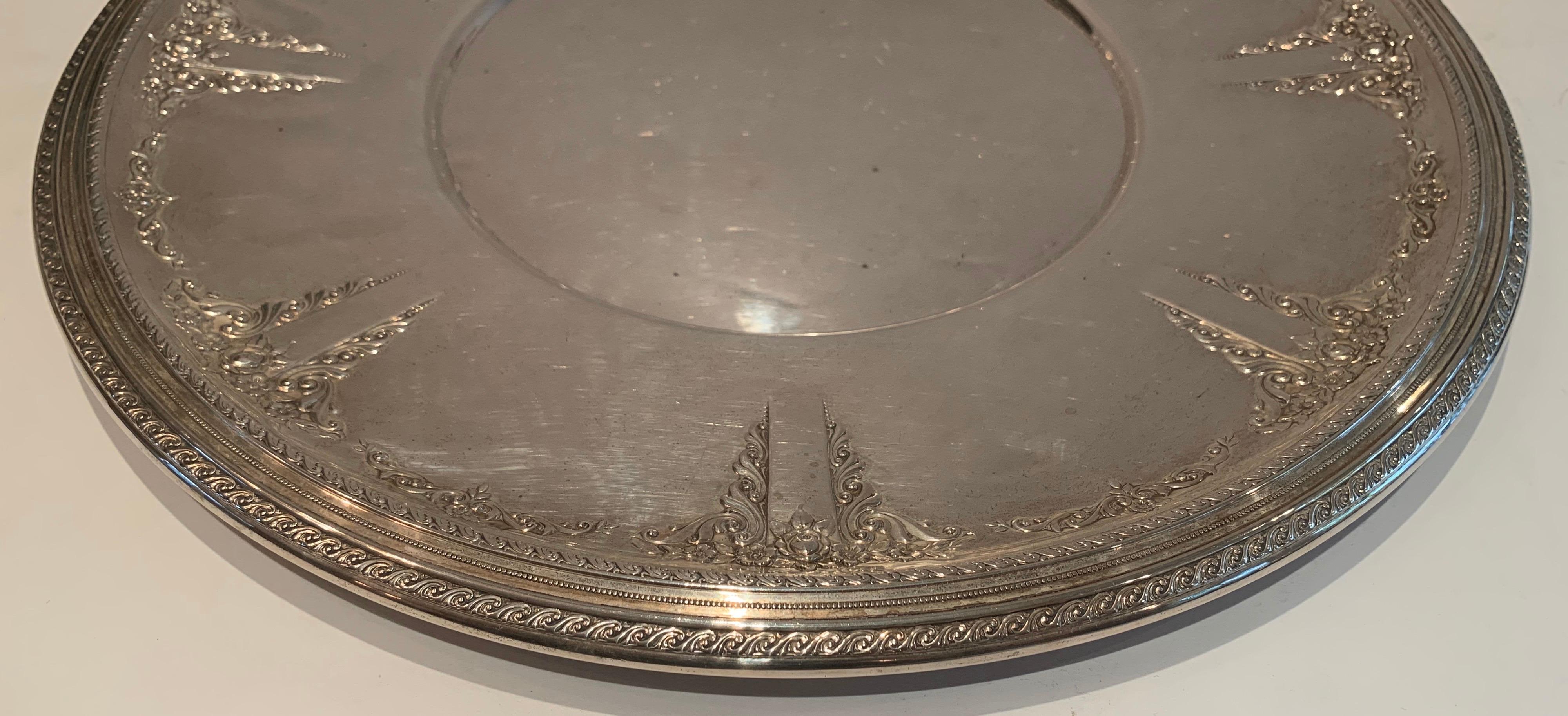 A wonderful large Wallace sterling silver round platter tray in the Mozart pattern.