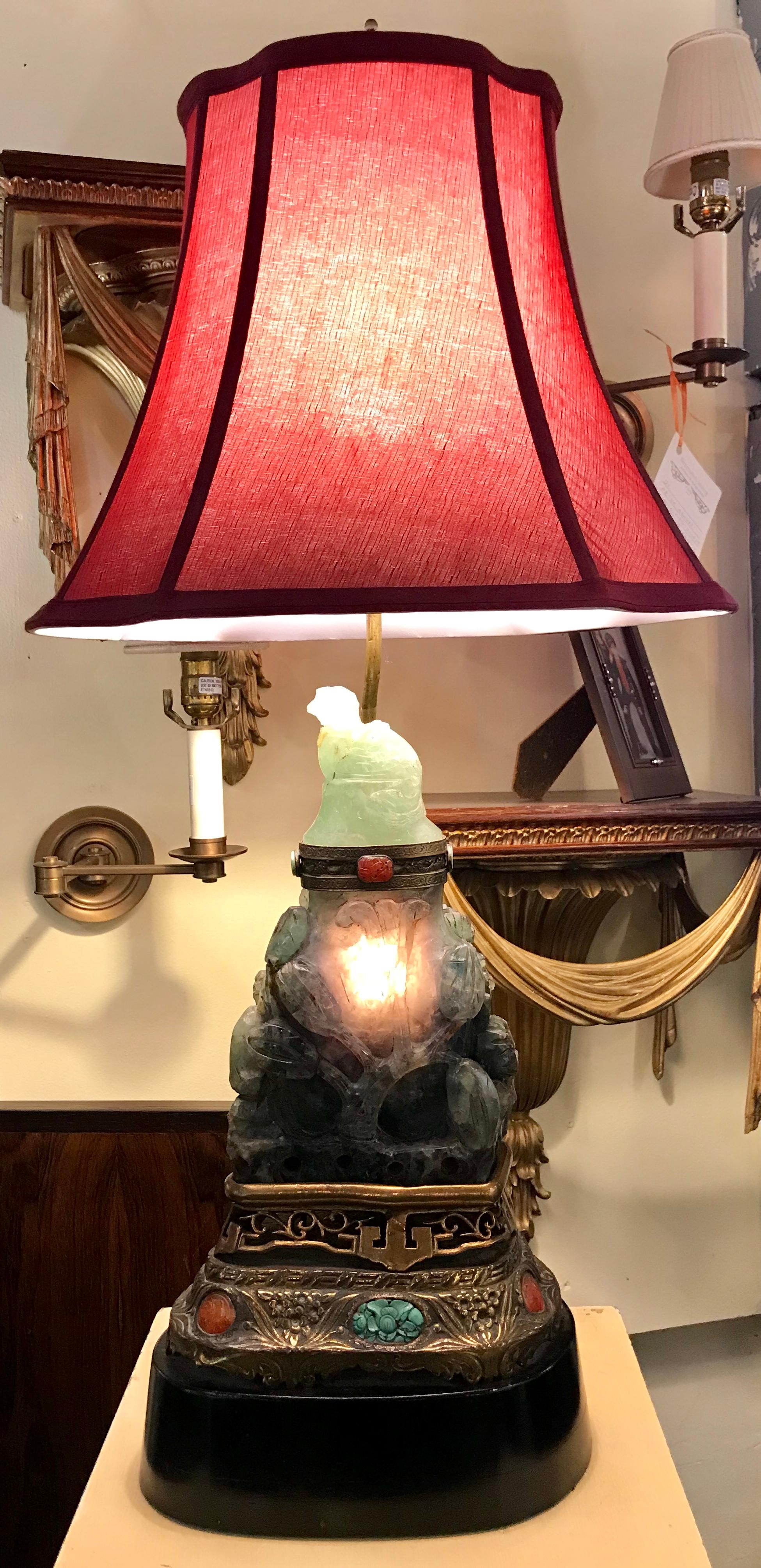 A wonderful early 20th century fluorite Lamp having a double bulb light on top and a double bulb lighted interior on a marble base.