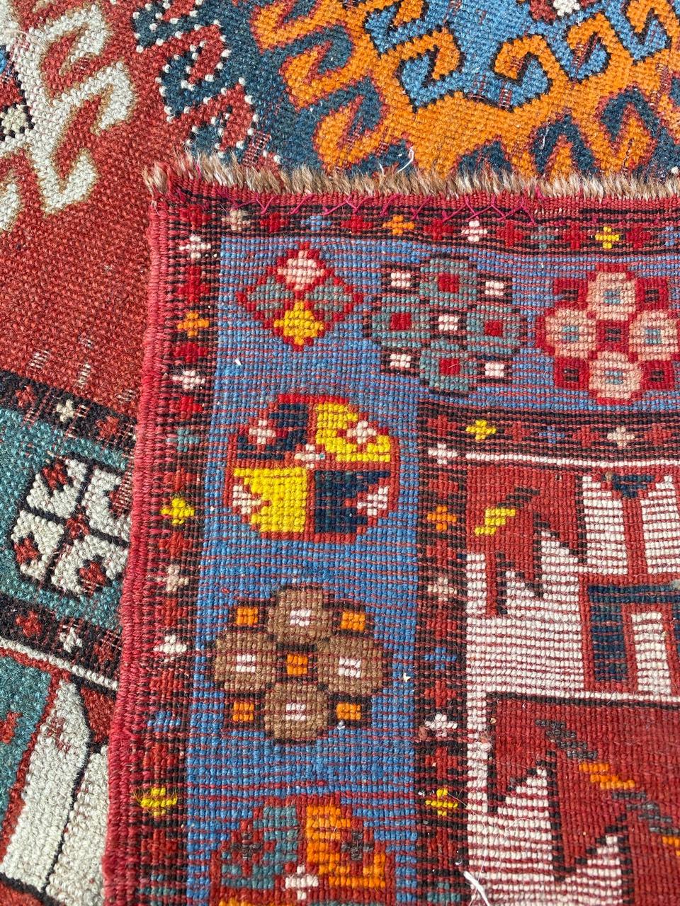 Very beautiful late 19th century Caucasian runner with a geometrical Caucasian design and beautiful colors with blue, orange, red and green, entirely hand knotted with wool velvet on wool foundation.