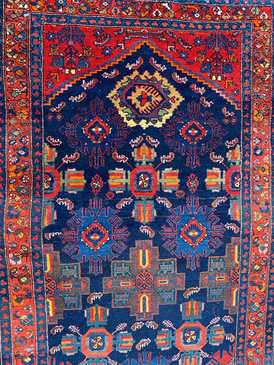 Very beautiful and colorful antique runner with beautiful decorative design and nice natural colors with blue, red, green, orange and yellow, entirely and finely hand knotted with wool velvet on cotton foundation.