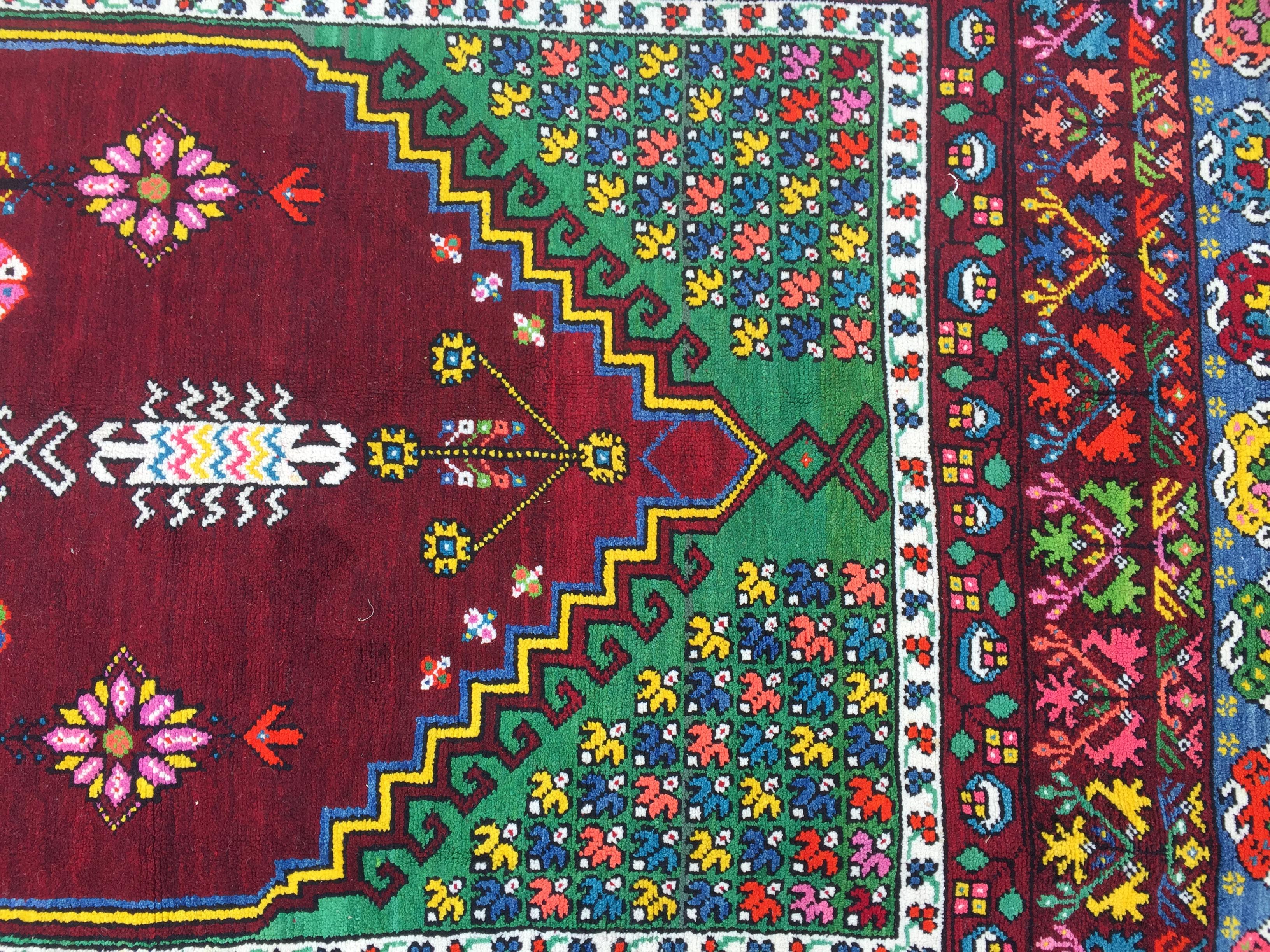 Very beautiful and decorative Moroccan rug from Rabat mid-20th century, geometrical design and nice colors with pink, blue, purple, yellow, green and orange, entirely hand knotted with wool velvet on cotton foundation.


  