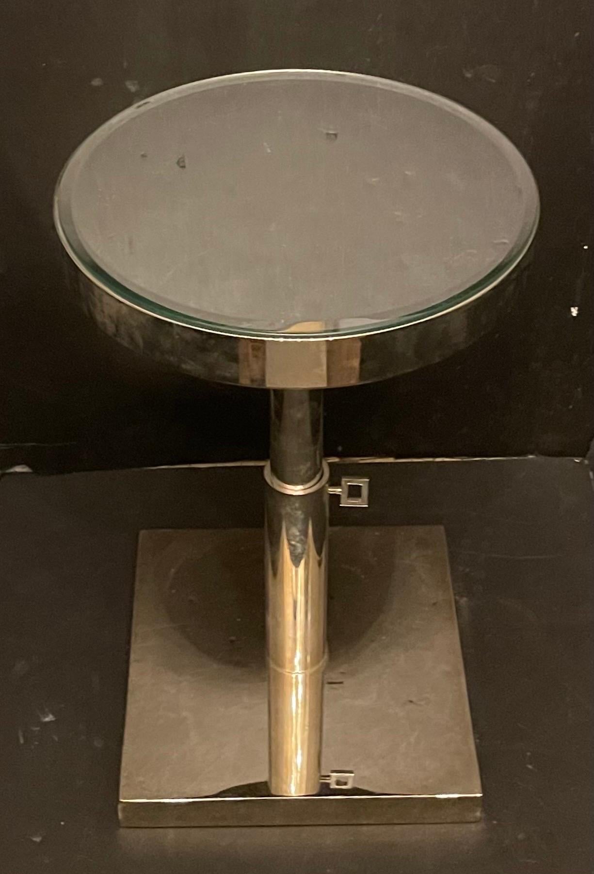 A wonderful Lorin Marsh polished nickel / chrome round mirrored top telescoping side table
Top is 12 1/4