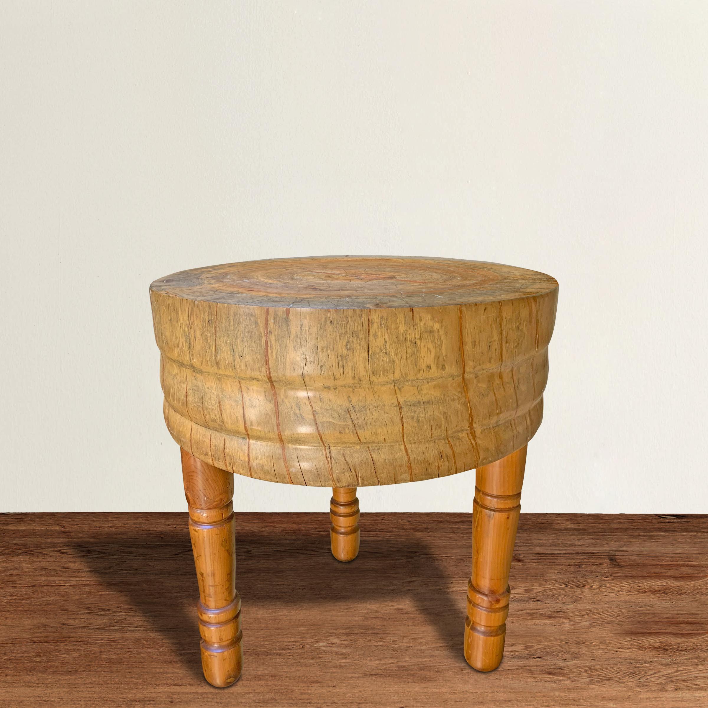 A wonderful mid-20th century round butcher block table with a solid maple top and turned pine legs. Perfectly safe for use in your kitchen, but would work great as a side table or bedside table.