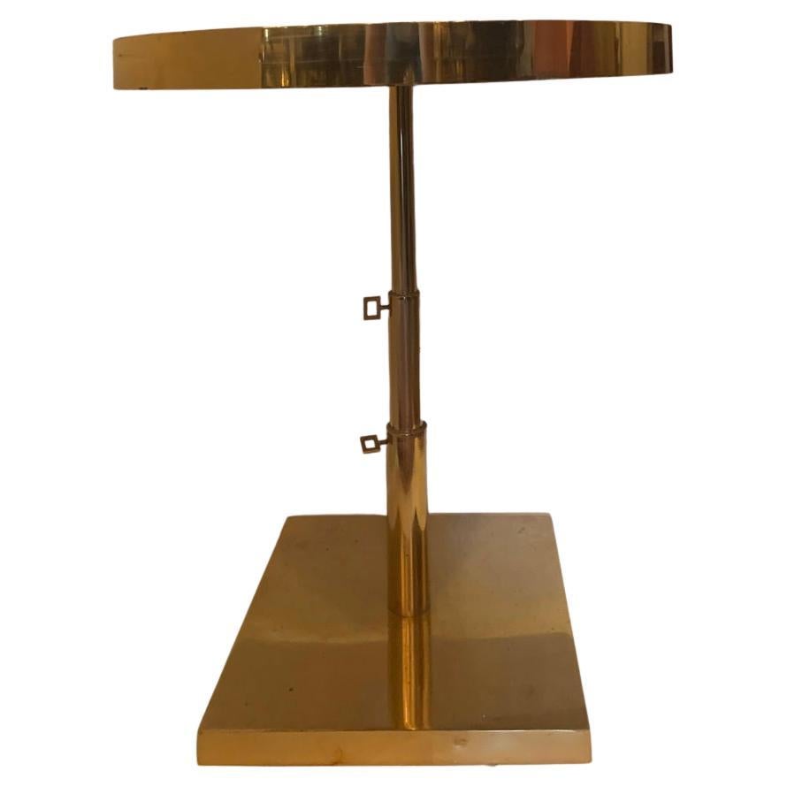 A wonderful Mid-Century Modern bronze and beveled mirror, telescoping round side table. 
Height is adjustable by 2 knobs.
Measures: 30