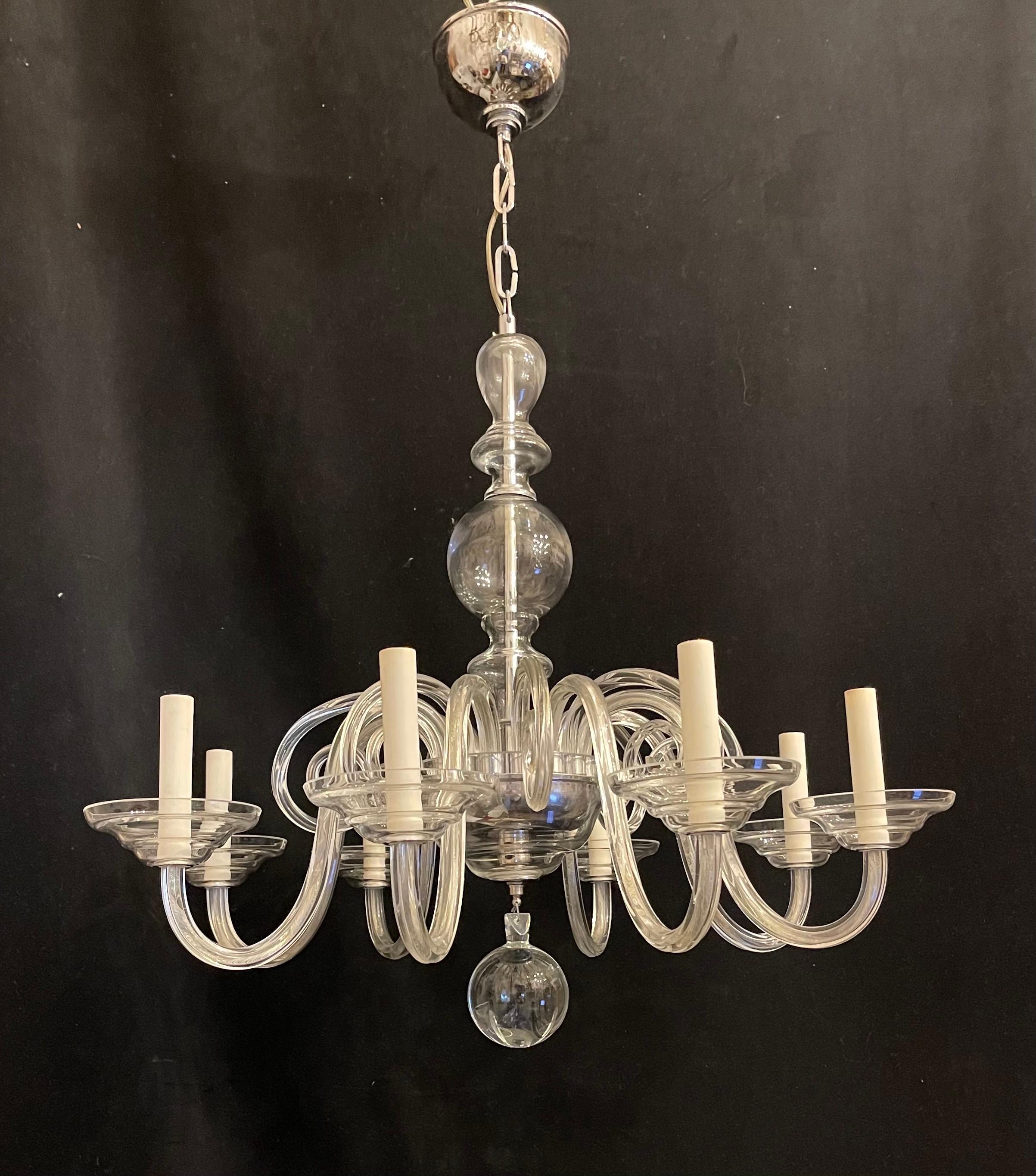 A Wonderful Mid-Century Modern crystal / glass & polished nickel 8 candelabras light fixture stream lined chandelier.
Rewired and comes with chain canopy and mounting hardware for installation.