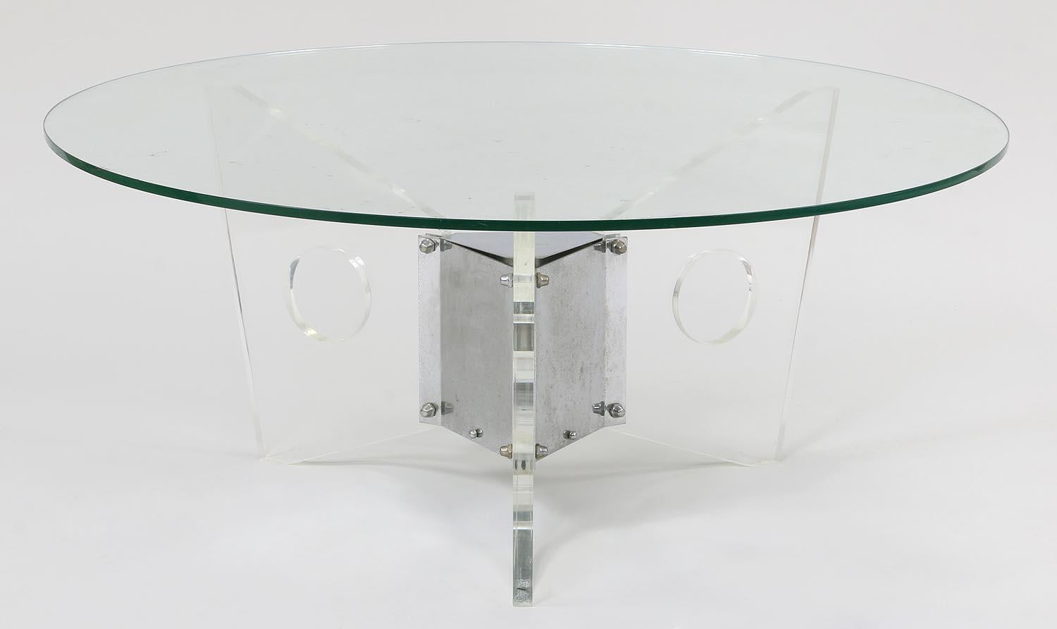 Wonderful Mid-Century Modern round glass top Lucite & chrome base coffee table In The Manner Of Springer

Measurements:
16-1/4'' H x 38'' D
Glass is replaceable if you wish to have a different width.