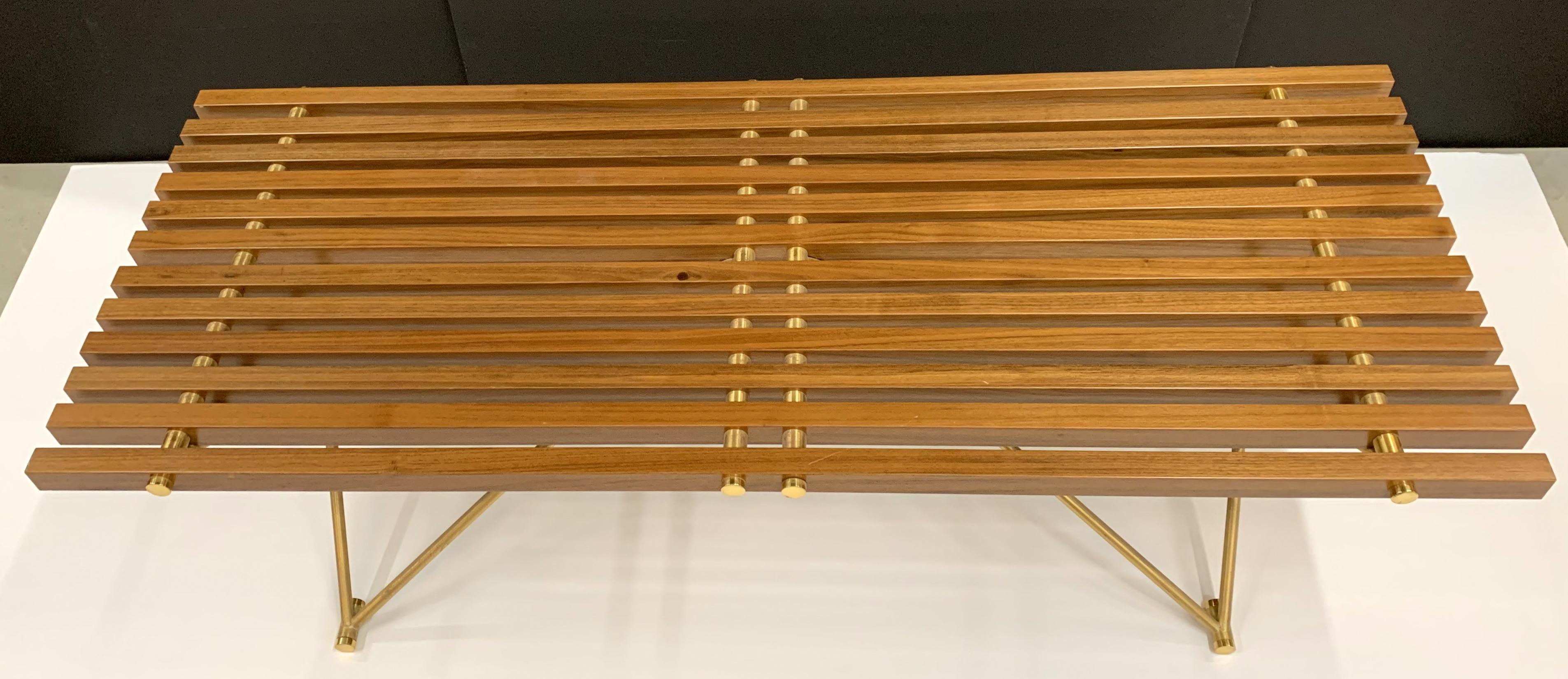 A wonderful Mid-Century Modern wood slat and polished brass coffee or cocktail table
Purchased from Lorin Marsh NYC.