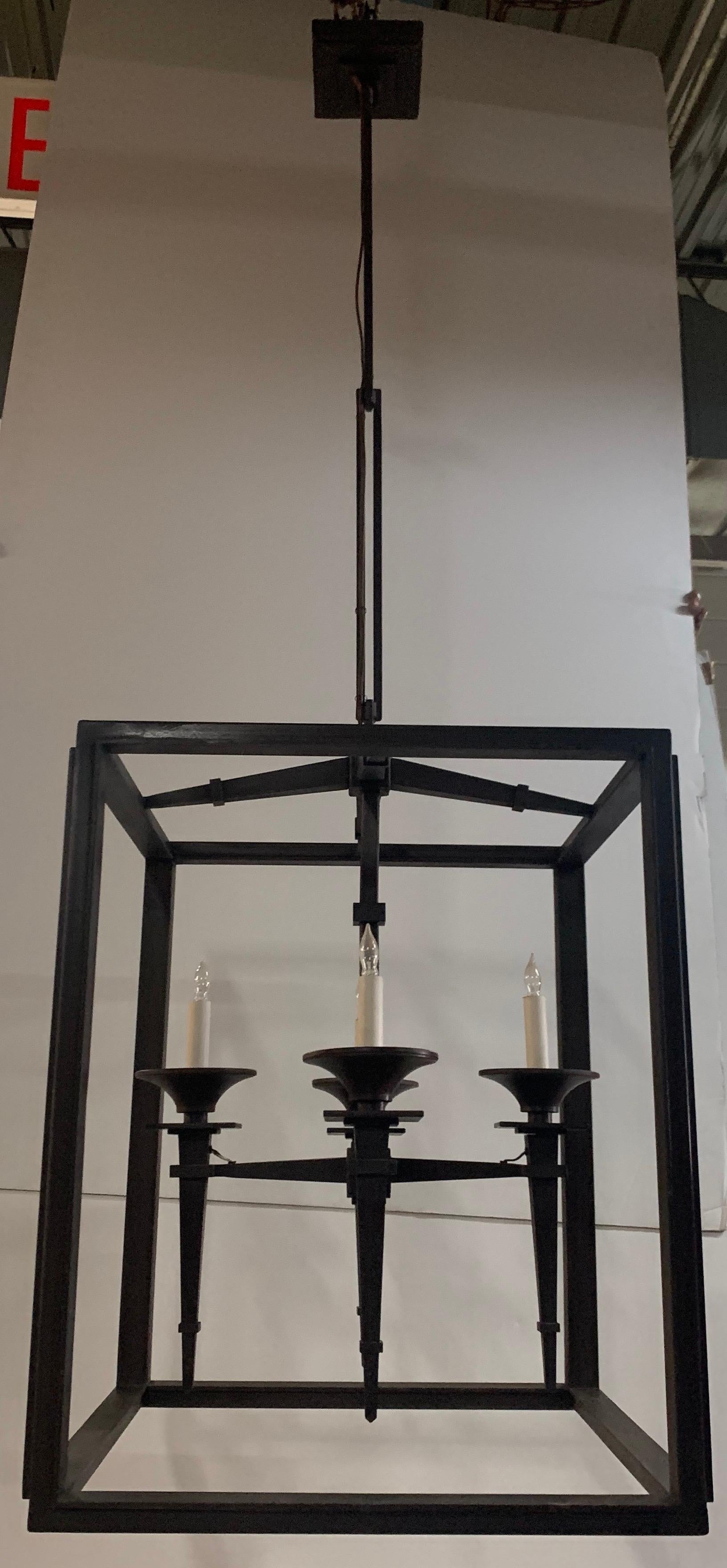 A wonderful midcentury retro modern / Deco style set of three large iron with bronze patina 4 candelabra lanterns.

Each sold separately.