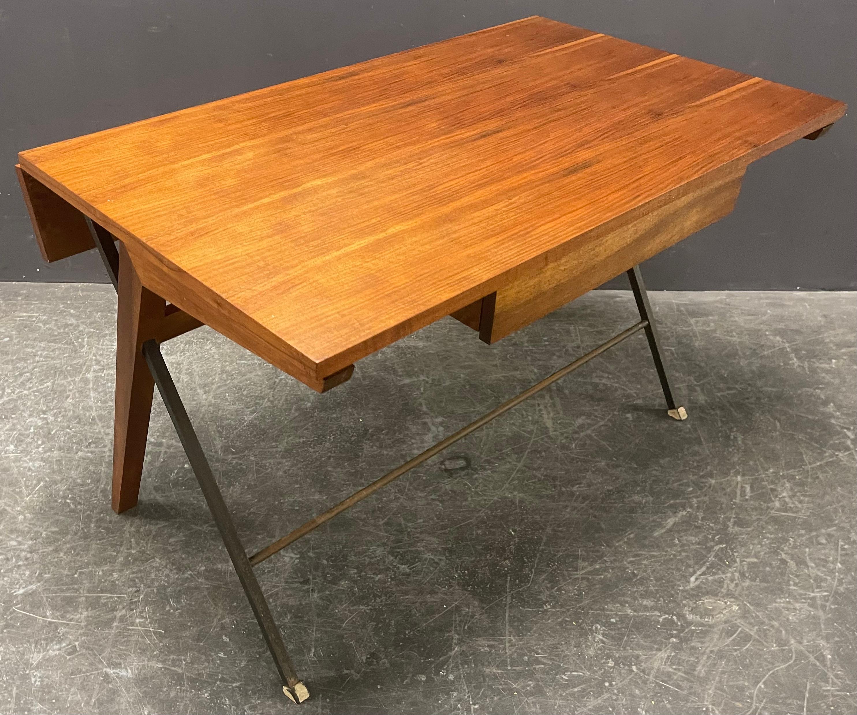 Great italien prototype desk from an architects estate full of wonderful mid century design and prototypes. we are very happy to offer this iconic italien desk , that has an breathtaking shape and combination of materials. so simple and elegant.....