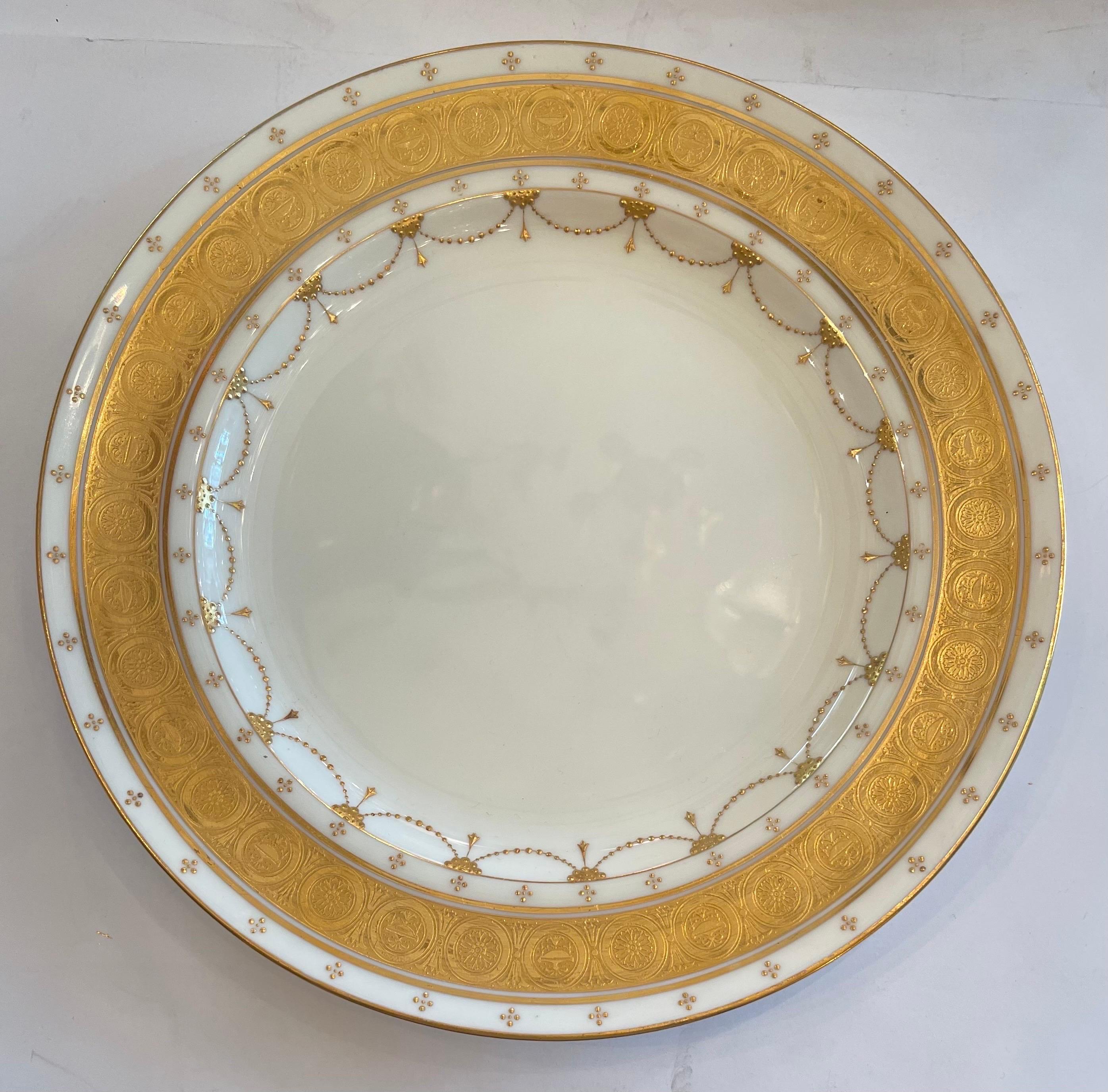 A Wonderful Minton Set Of 11 Service Dinner Plates With Encrusted Raised Gold Urn Rim And Beaded Swag Design Border.