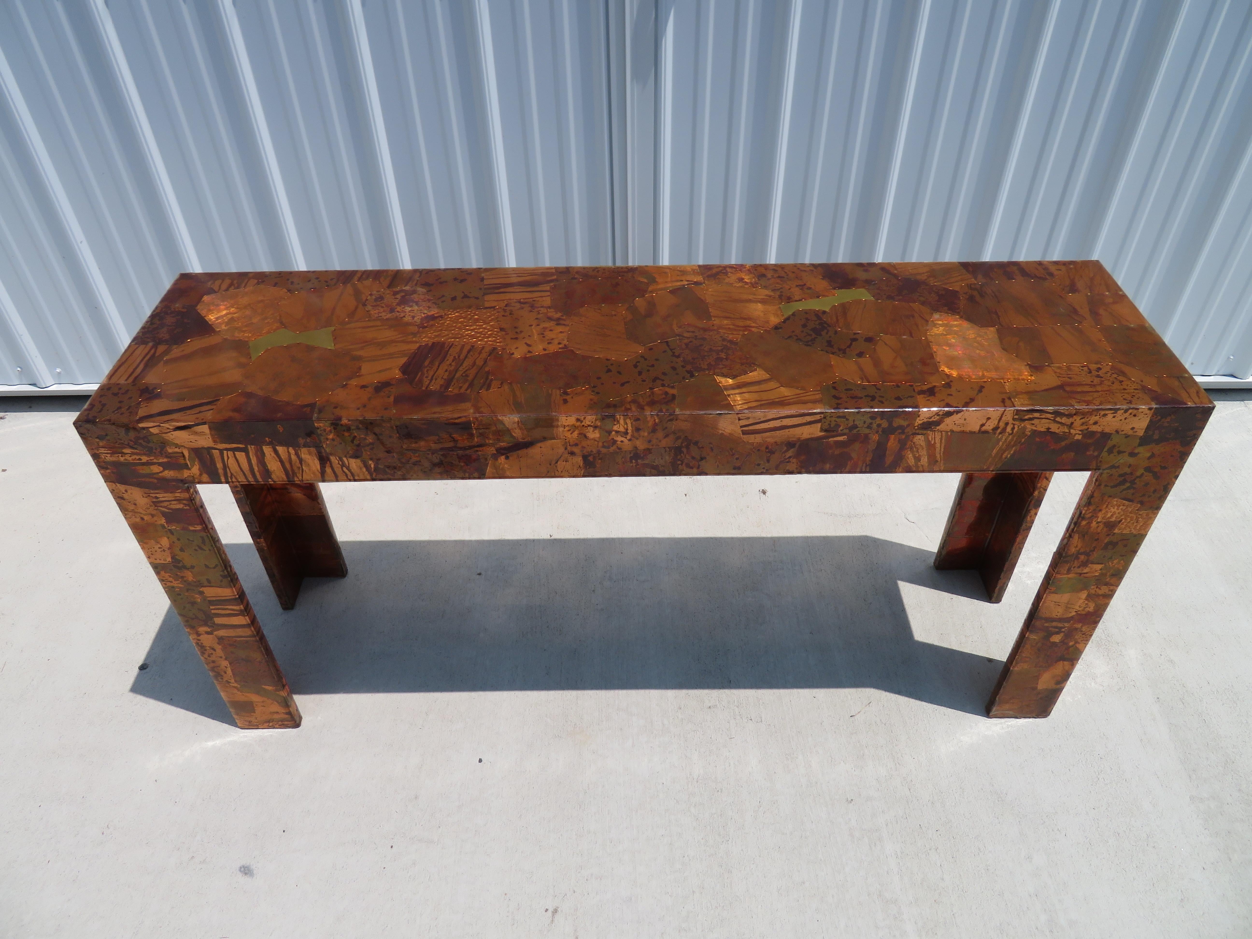 Wonderful mixed metal oatchwork brutalist console table In the Style of Paul Evans. Rarely seen copper etched, patchwork style console table by Brazilian modernist Furniture maker Percival Lafer born 1936-signature on leg-see photo. Each piece of