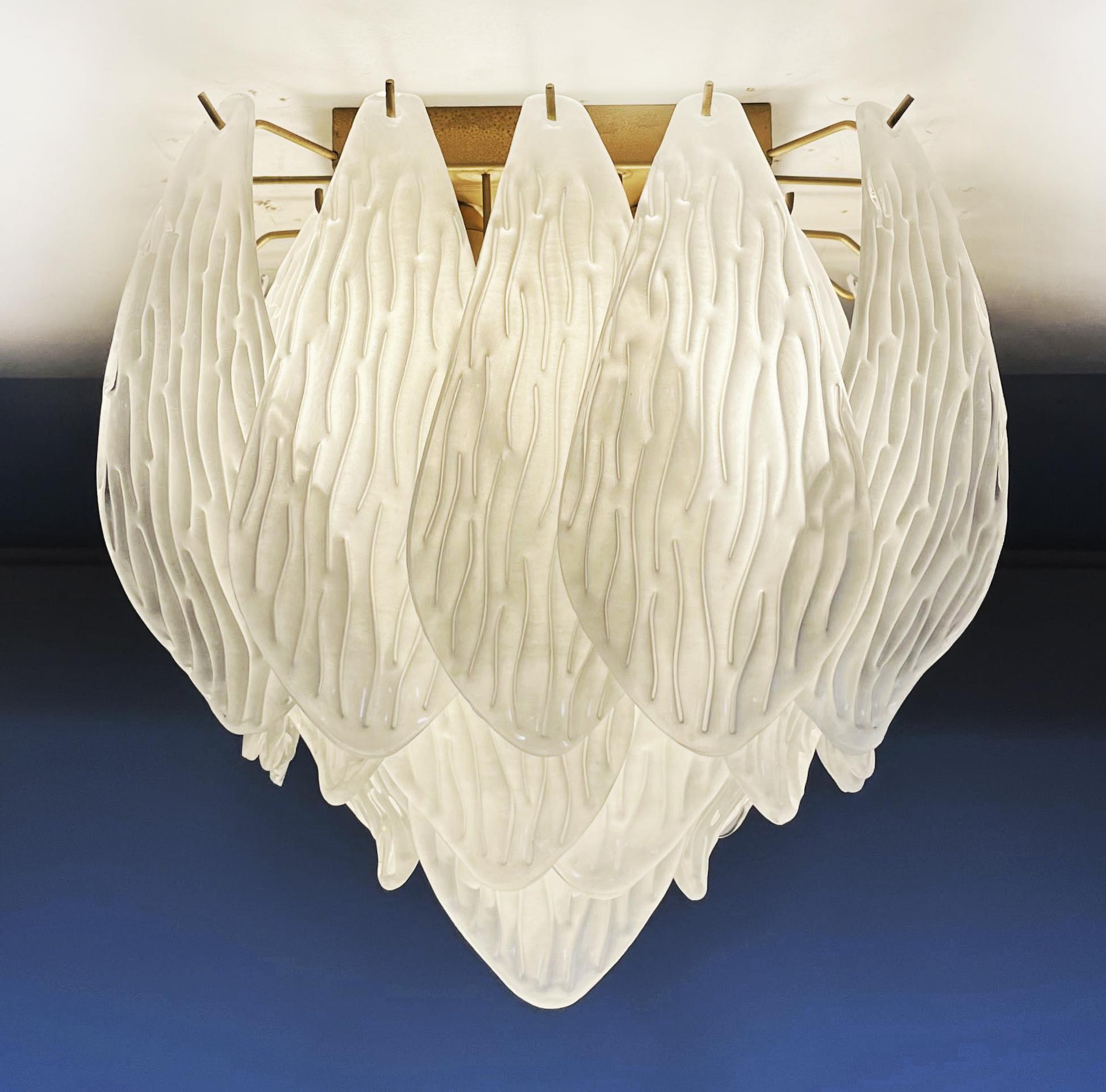 Spectacular ceiling lamps with 32 Murano frosted carved glass leaves in golden painted metal frame. Elegant lighting object. Period: late XX century
Dimensions: 17,50 inchs (45 cm) height; 15,50 inches (40 cm) width; 15,50 inches (40 cm)