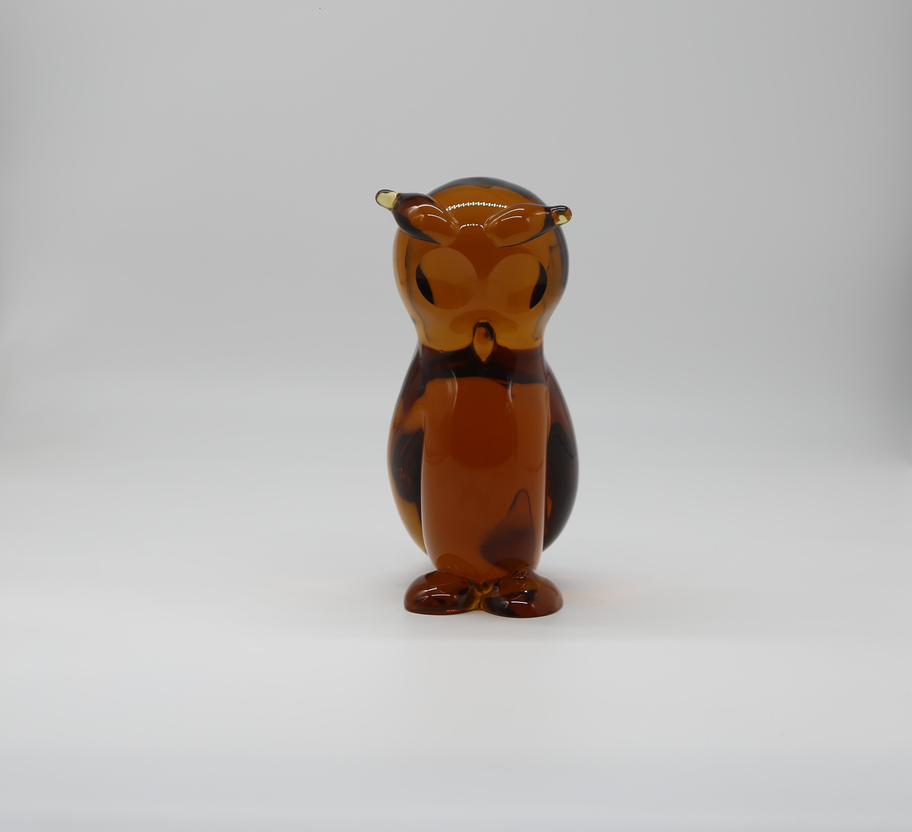 Wonderful owl-shaped glass by Archimede Seguso.

Amber colored artistic glass in excellent condition, for owl lovers
