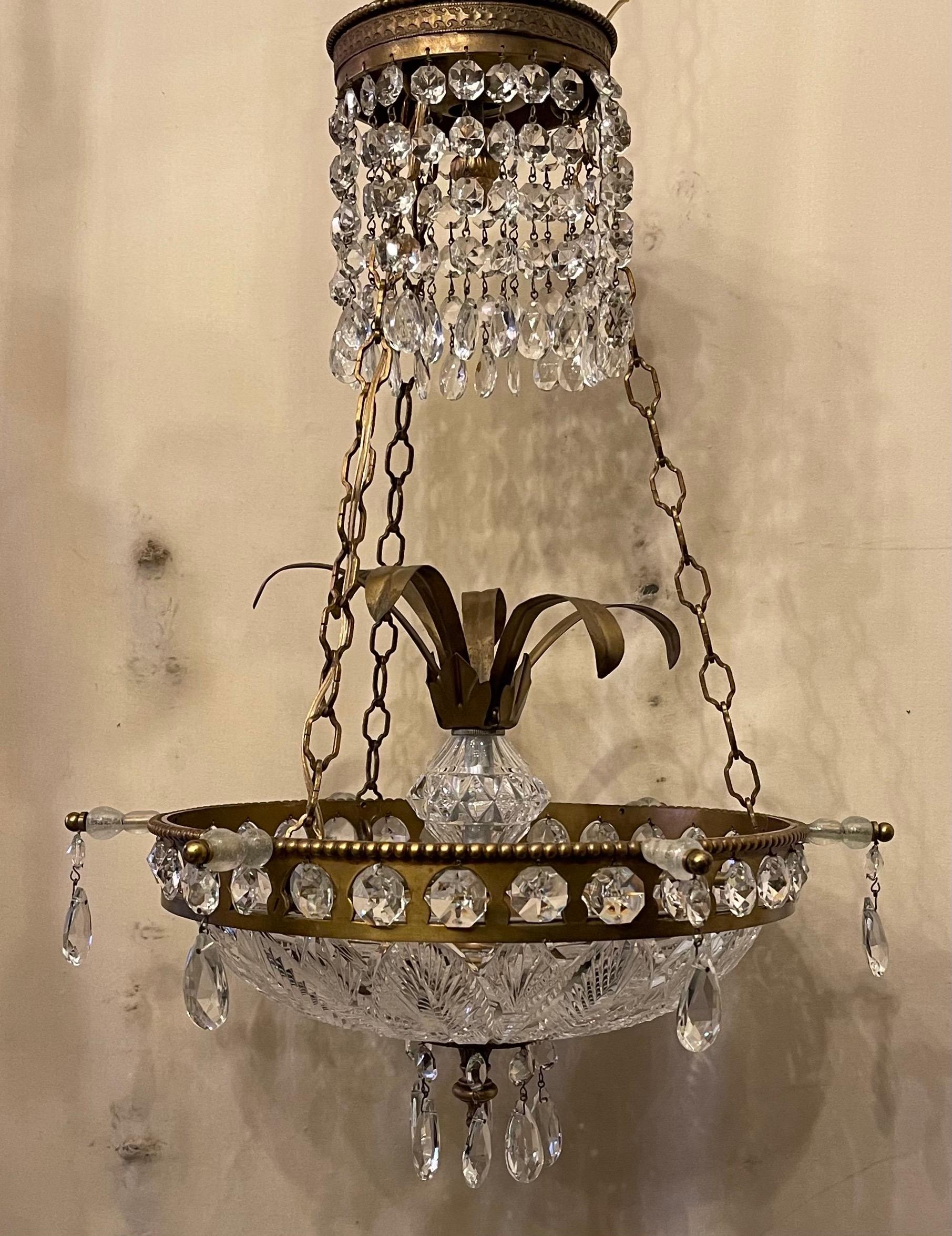 A wonderful neoclassical etched cut-crystal fern bowl with bronze ormolu housing chandelier, this fixture is currently 20