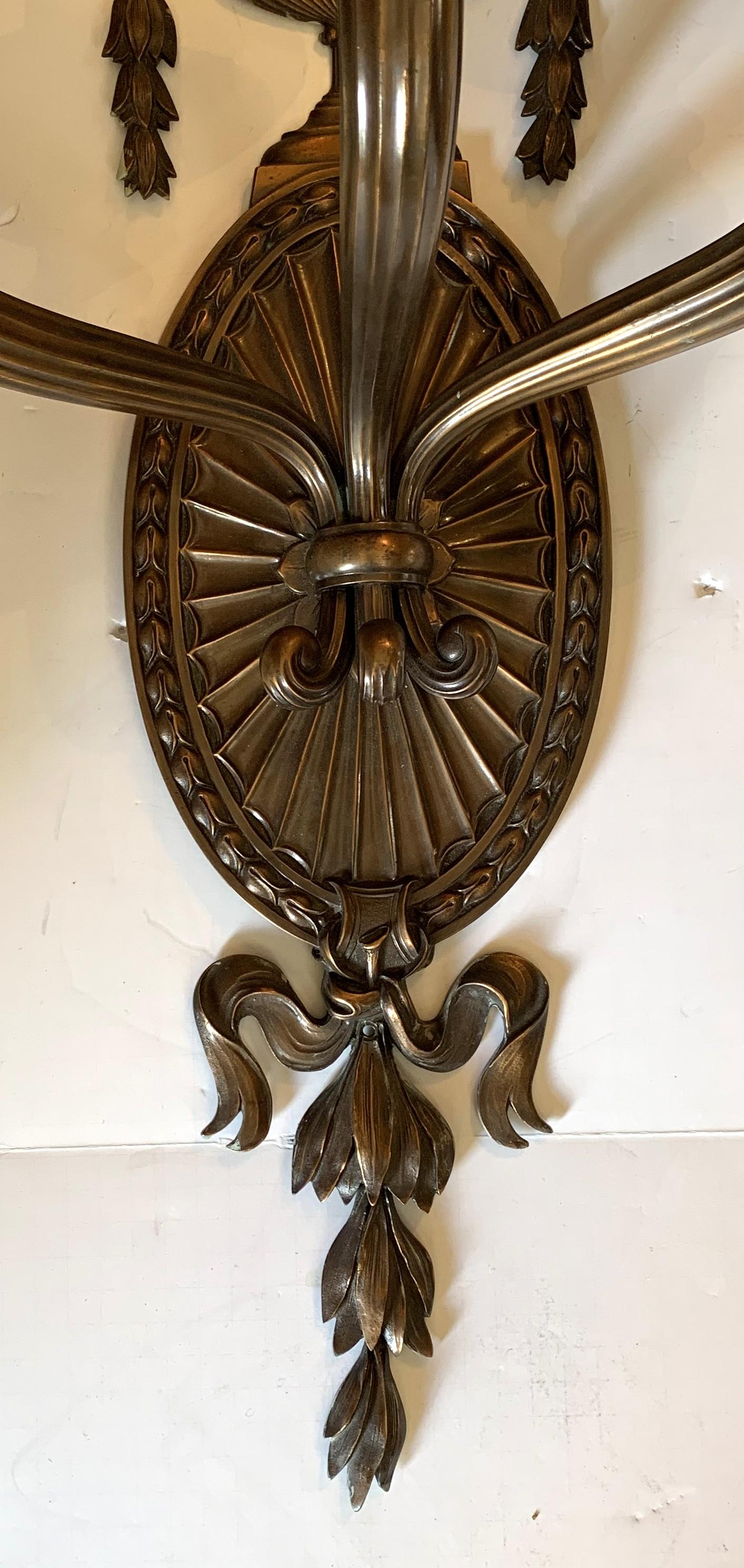 Wonderful Neoclassical Patinated Bronze Large Urn 3-Light Caldwell Sconces, Pair In Good Condition For Sale In Roslyn, NY
