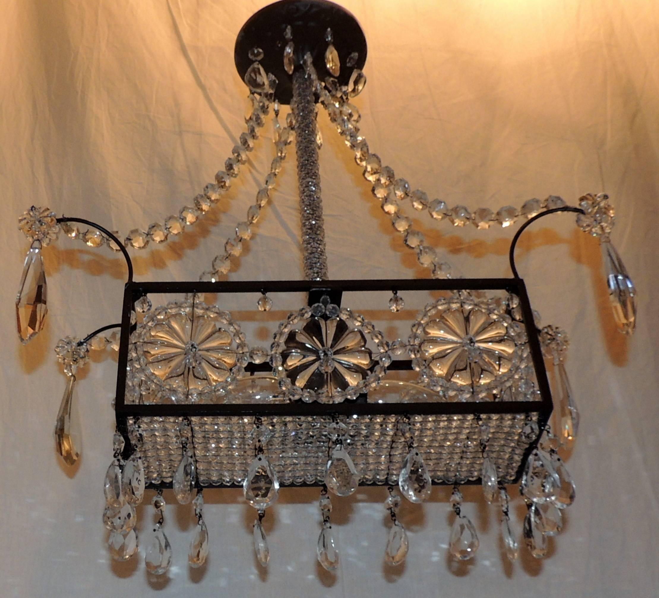 A wonderful Pair beaded Italian, rectangle form flower crystal basket two Edison light fixtures. Each has 2 Edison bulbs Taking A Max. 75 Watts Per Socket.
These beautiful fixtures can be made any height by cutting the center shaft or adding chain